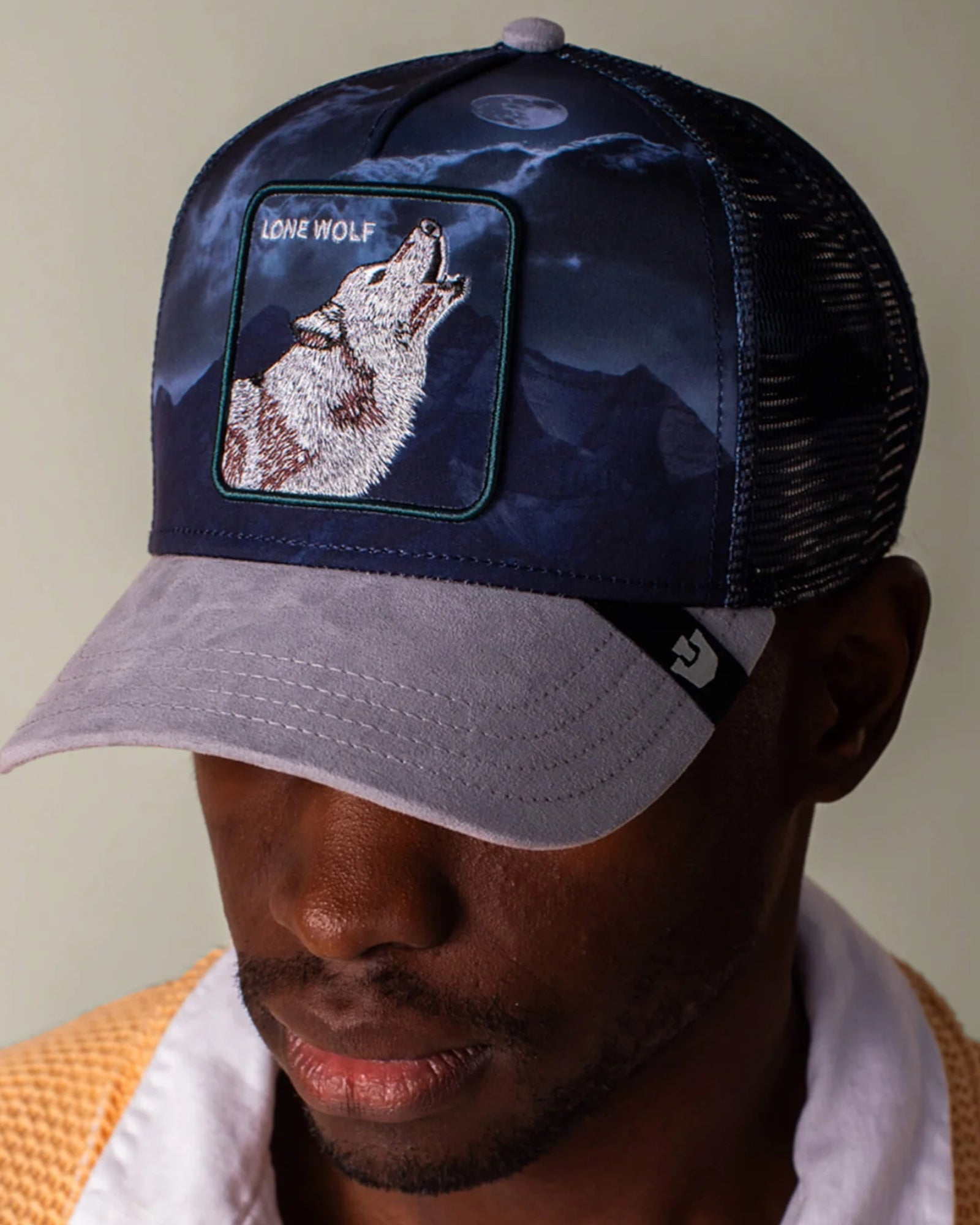 Goorin Bros Wolf In The Element Gloss cap featuring a wolf design in a sleek, shiny finish, stylish headwear for casual wear.