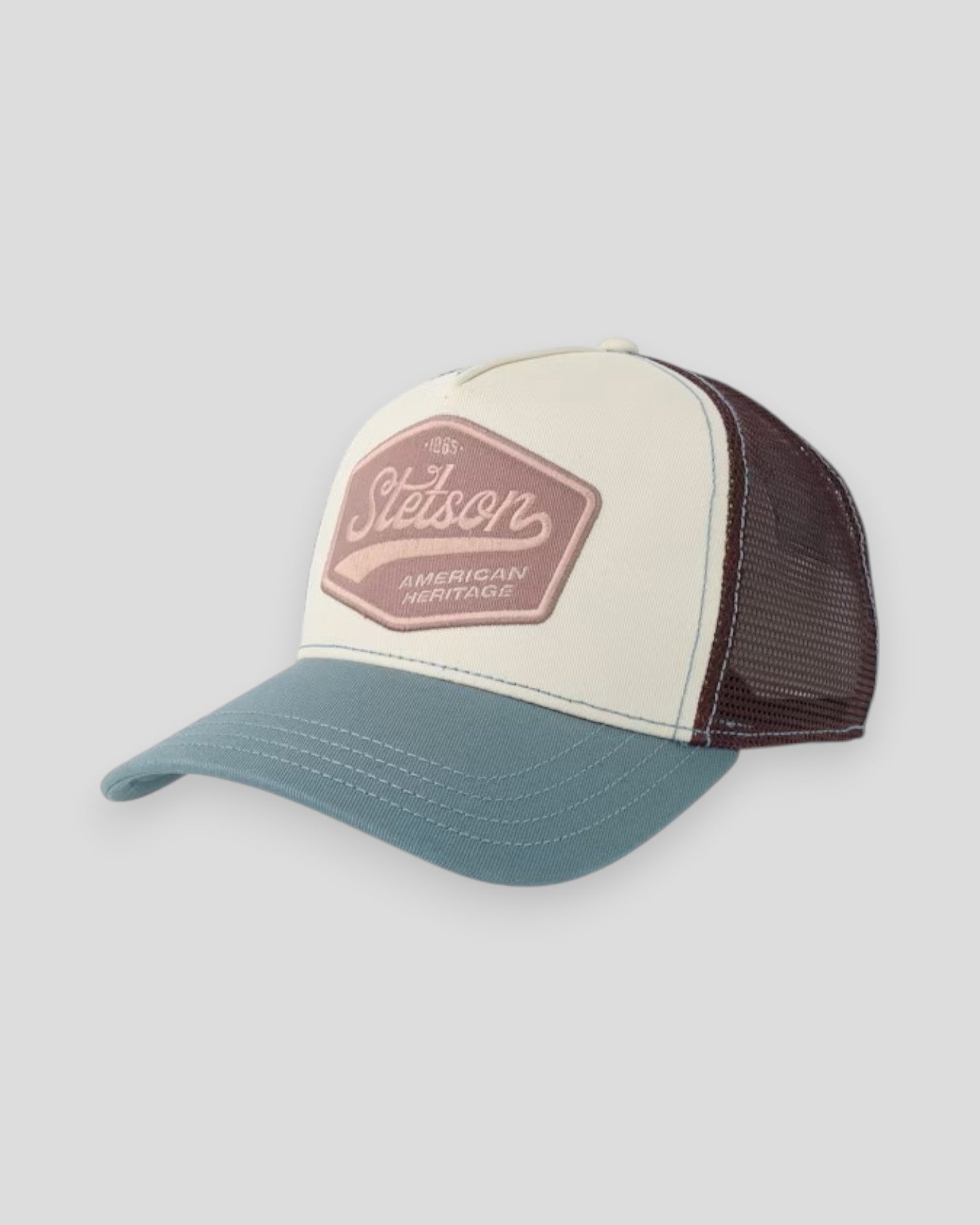 Stetson Trucker Cap in pastel white, blue, and purple with mesh back and curved brim, casual headwear for outdoor wear.