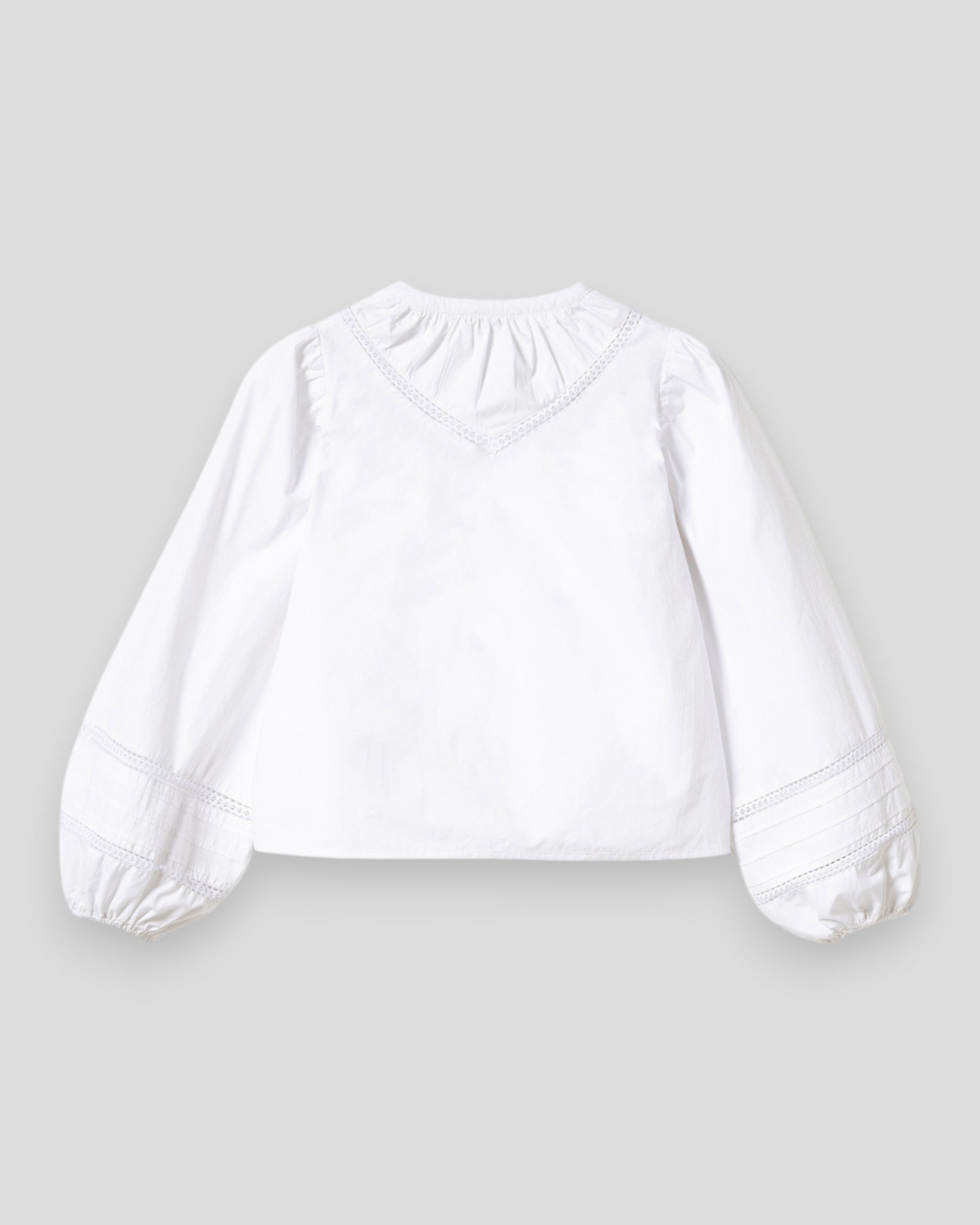 Noella N-Marceline white women's blouse, stylish shirt with a feminine fit and elegant design, shown on a model.