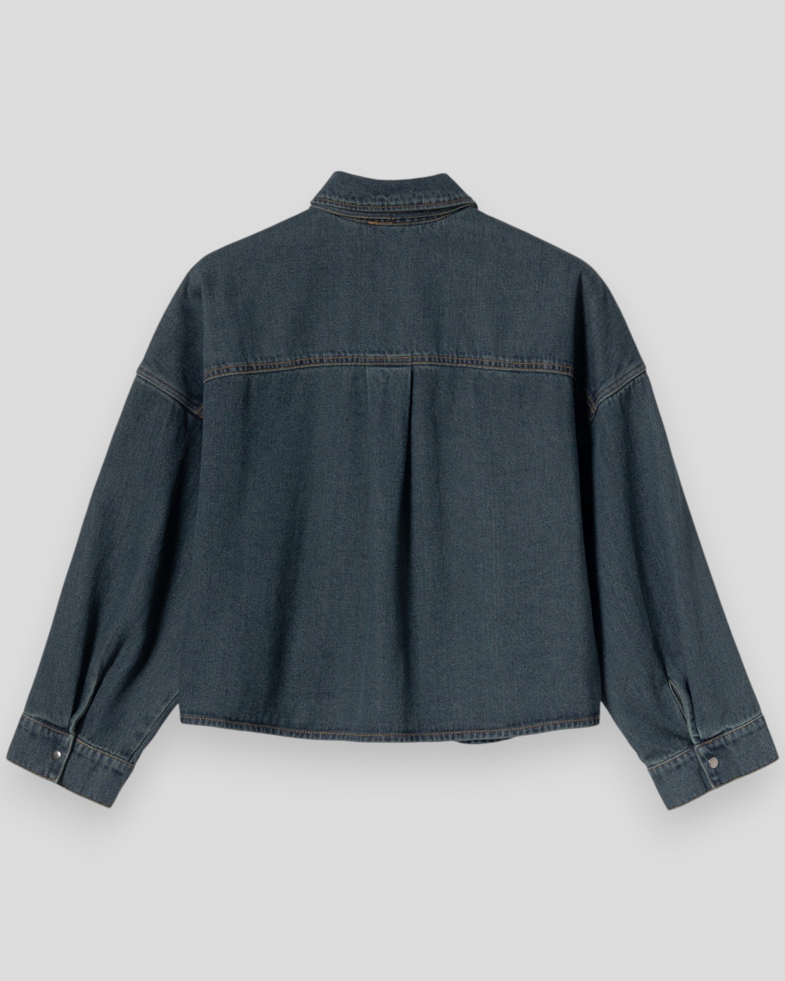 Noella N-Lirinnah women's shirt in vintage blue wash with a casual, relaxed fit and classic collar, displayed on a hanger.