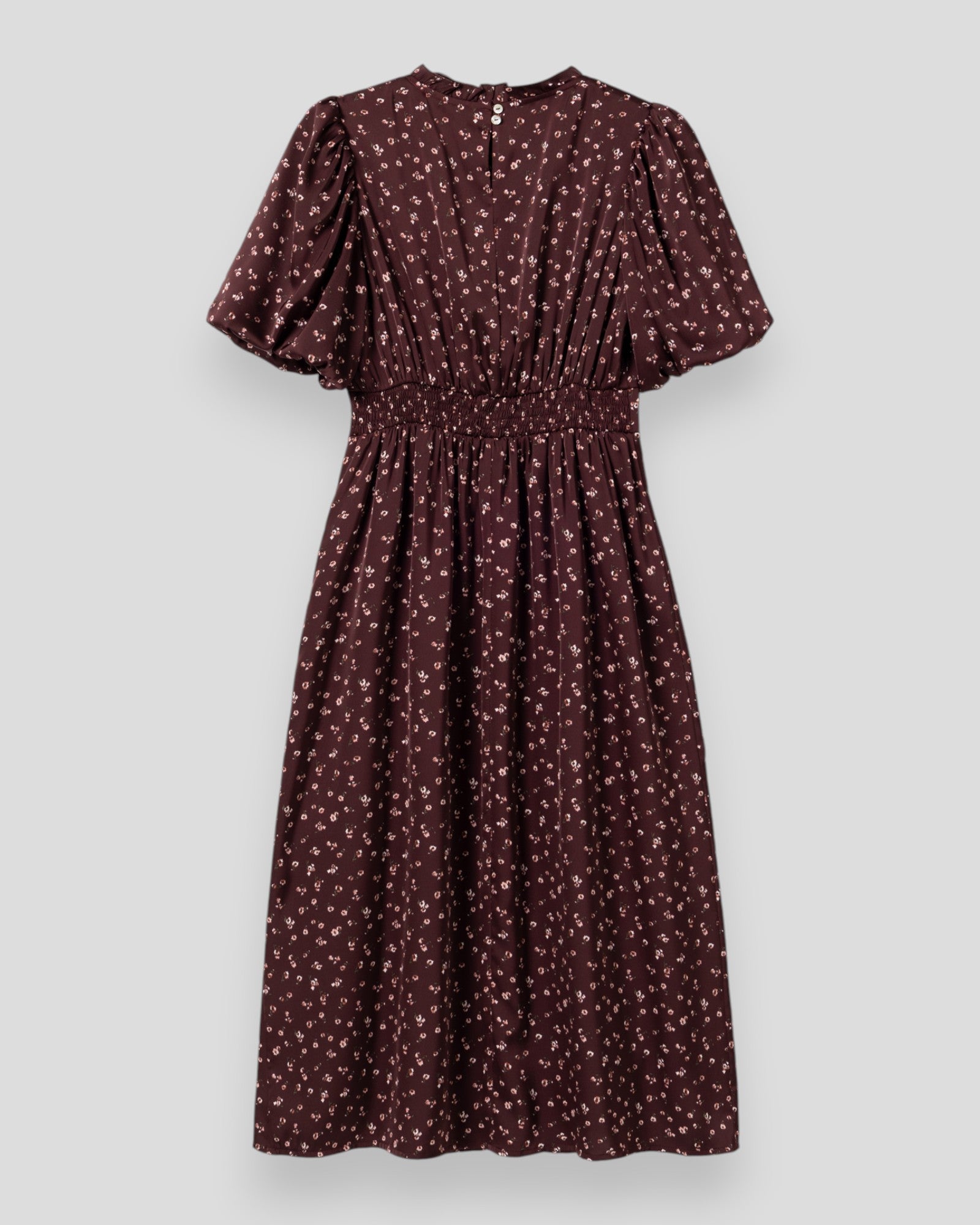 Noella N-Ruth kjole i burgundy print med blomsterdesign, vises med tæt pasform og elegante detaljer.