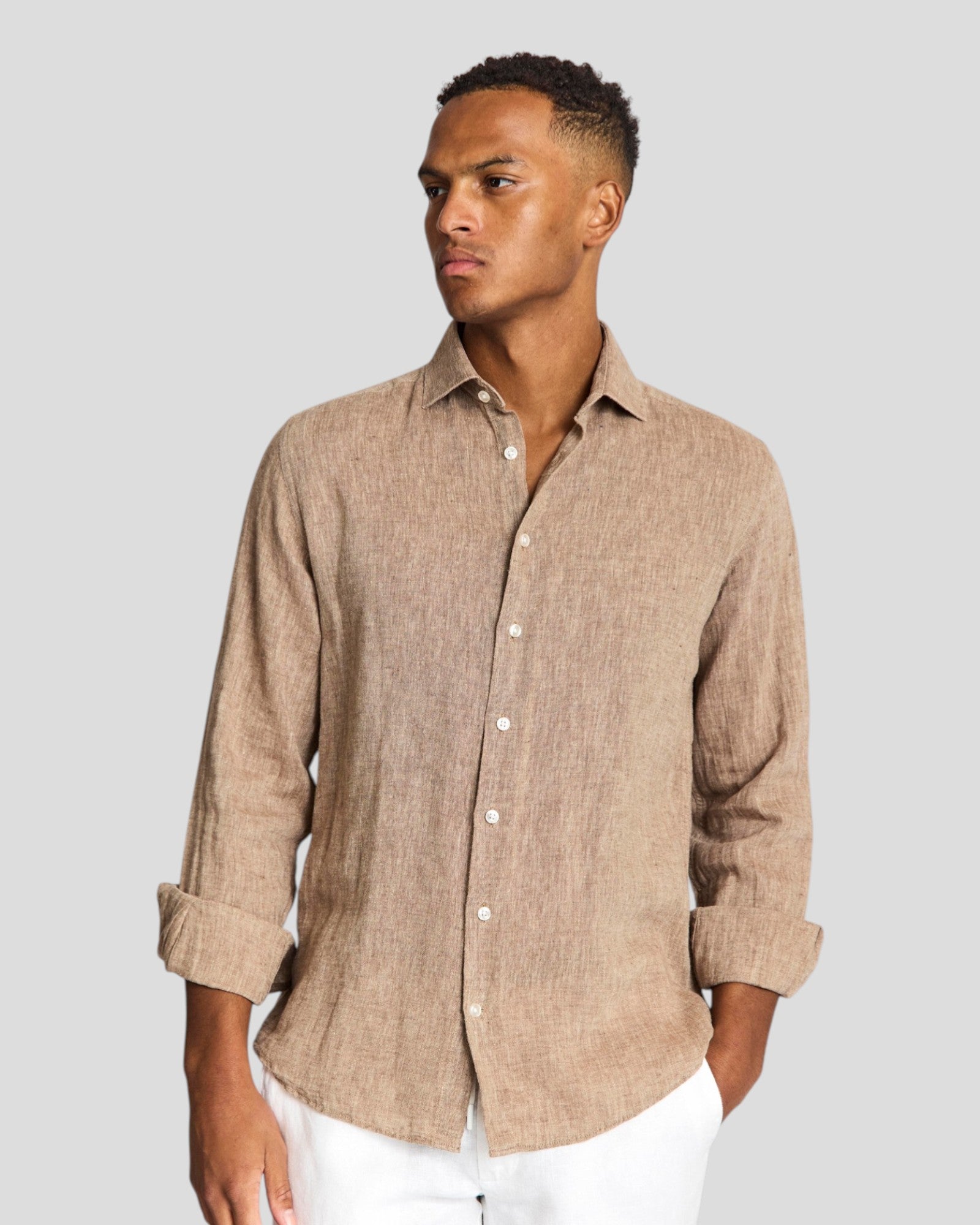 Bruun & Stengade Tahaka modern fit brown shirt displayed flat with collar and buttons, made from lightweight fabric.