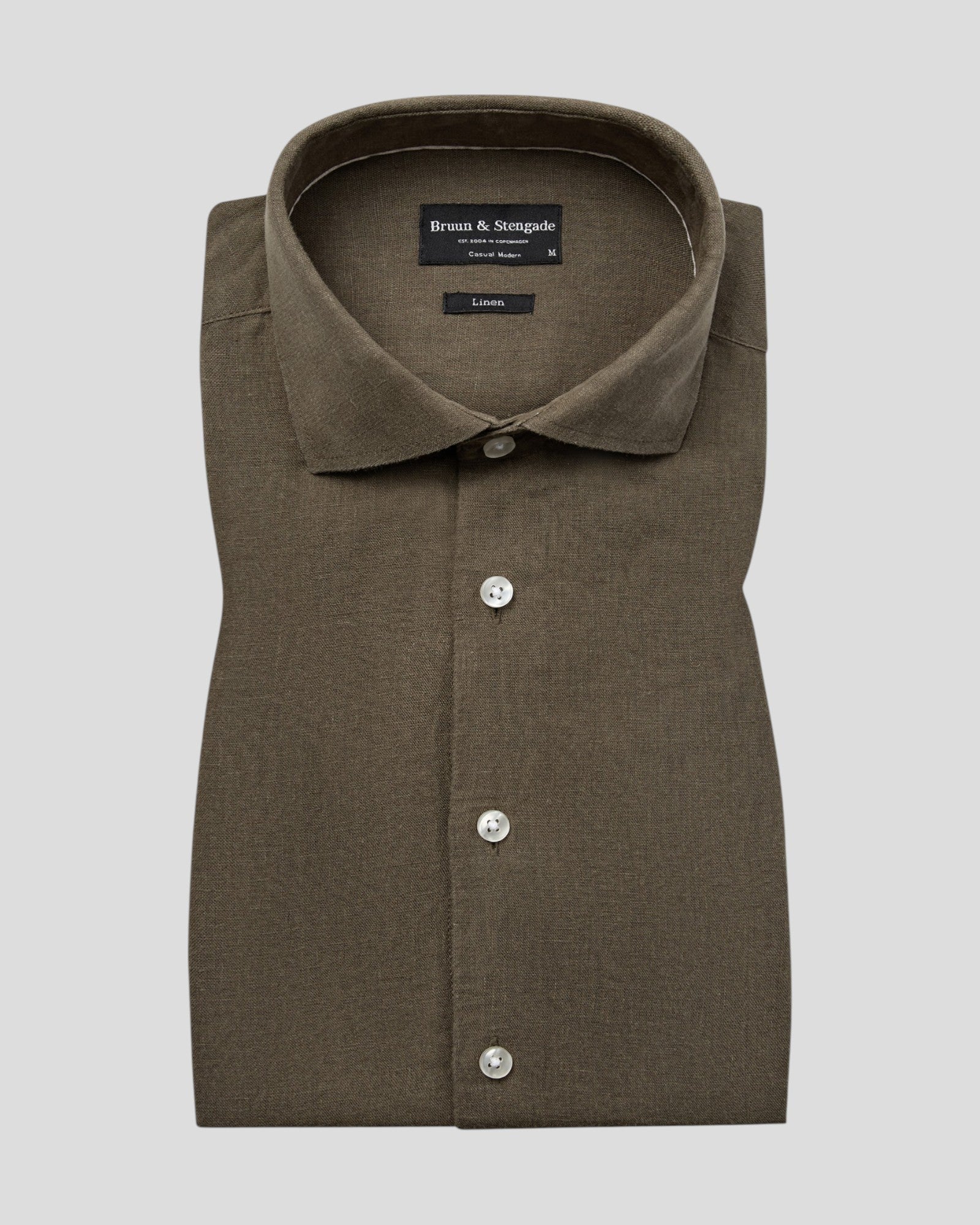Green Tahaka Modern Fit Shirt by Bruun & Stengade, showing a tailored casual shirt with a classic collar and button front.