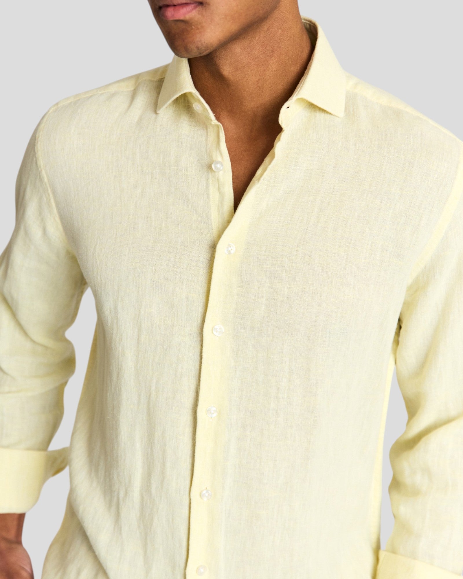 Yellow Tahaka Modern Fit Shirt by Bruun & Stengade, shown laid flat with collar and buttons visible.