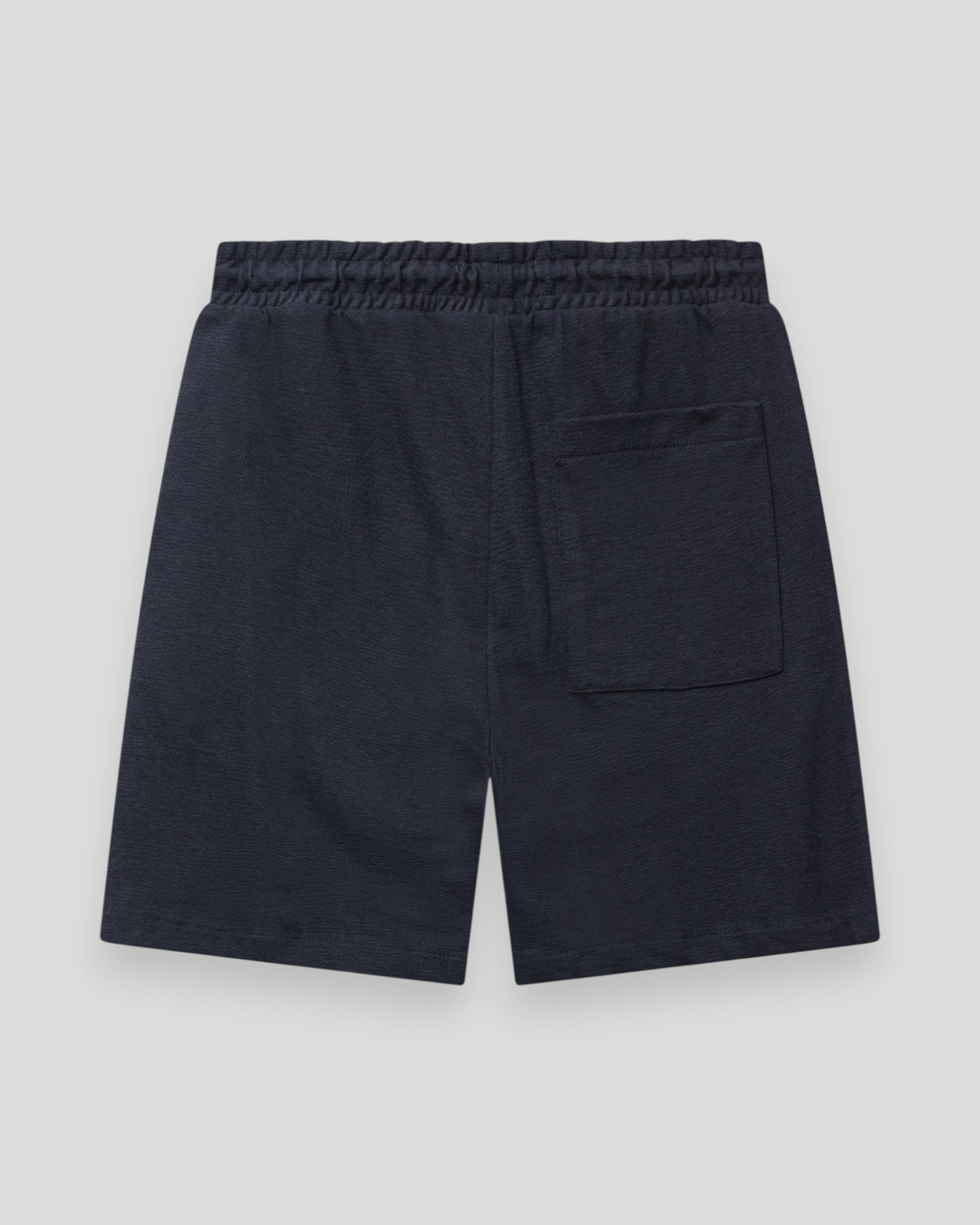 Navyblå Calton strukturerede shorts fra Clean Cut Copenhagen, vises med detaljeret stof og pasform.