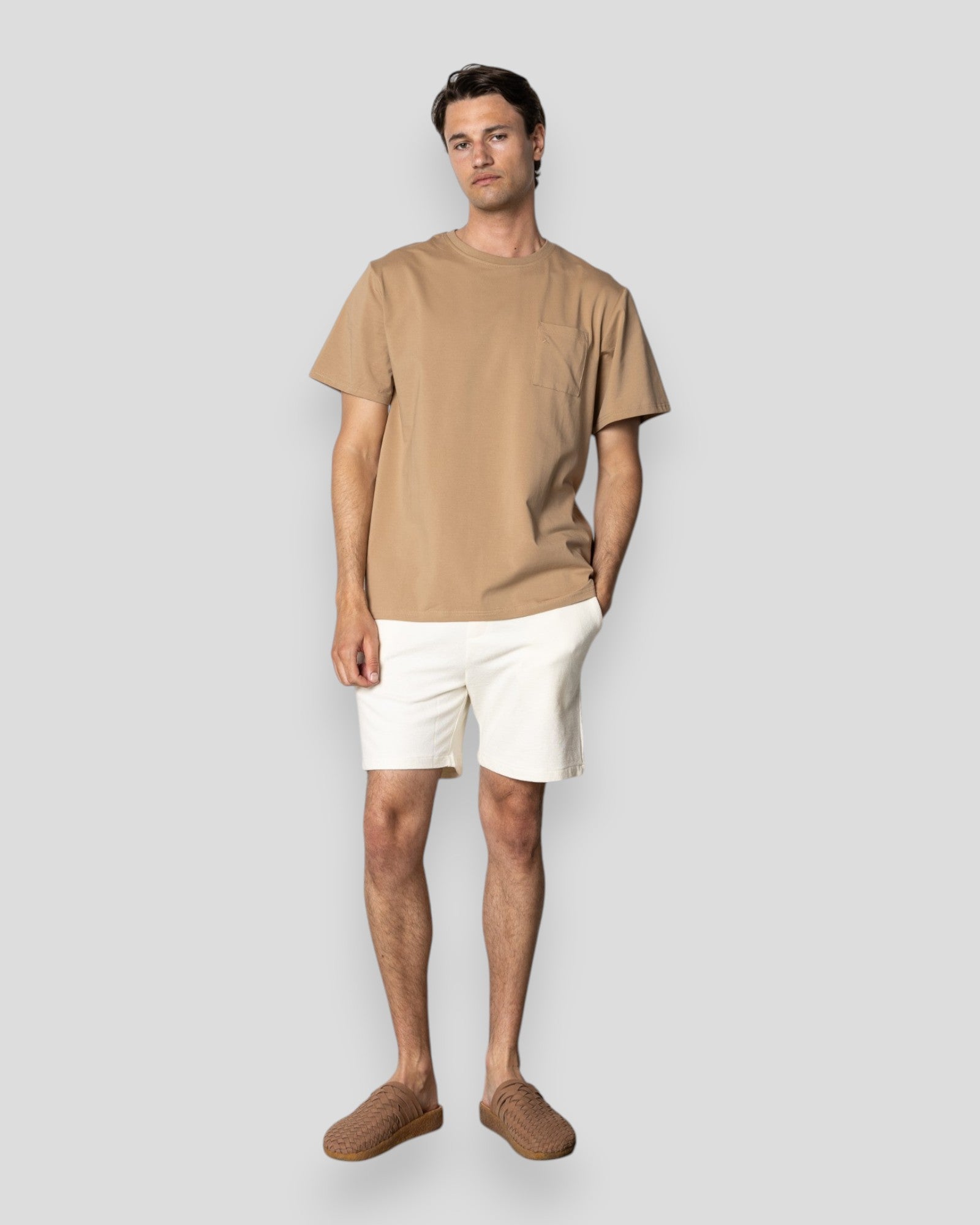 Ecru strukturerede shorts fra Clean Cut Copenhagen med canvas-tekstur og afslappet pasform.