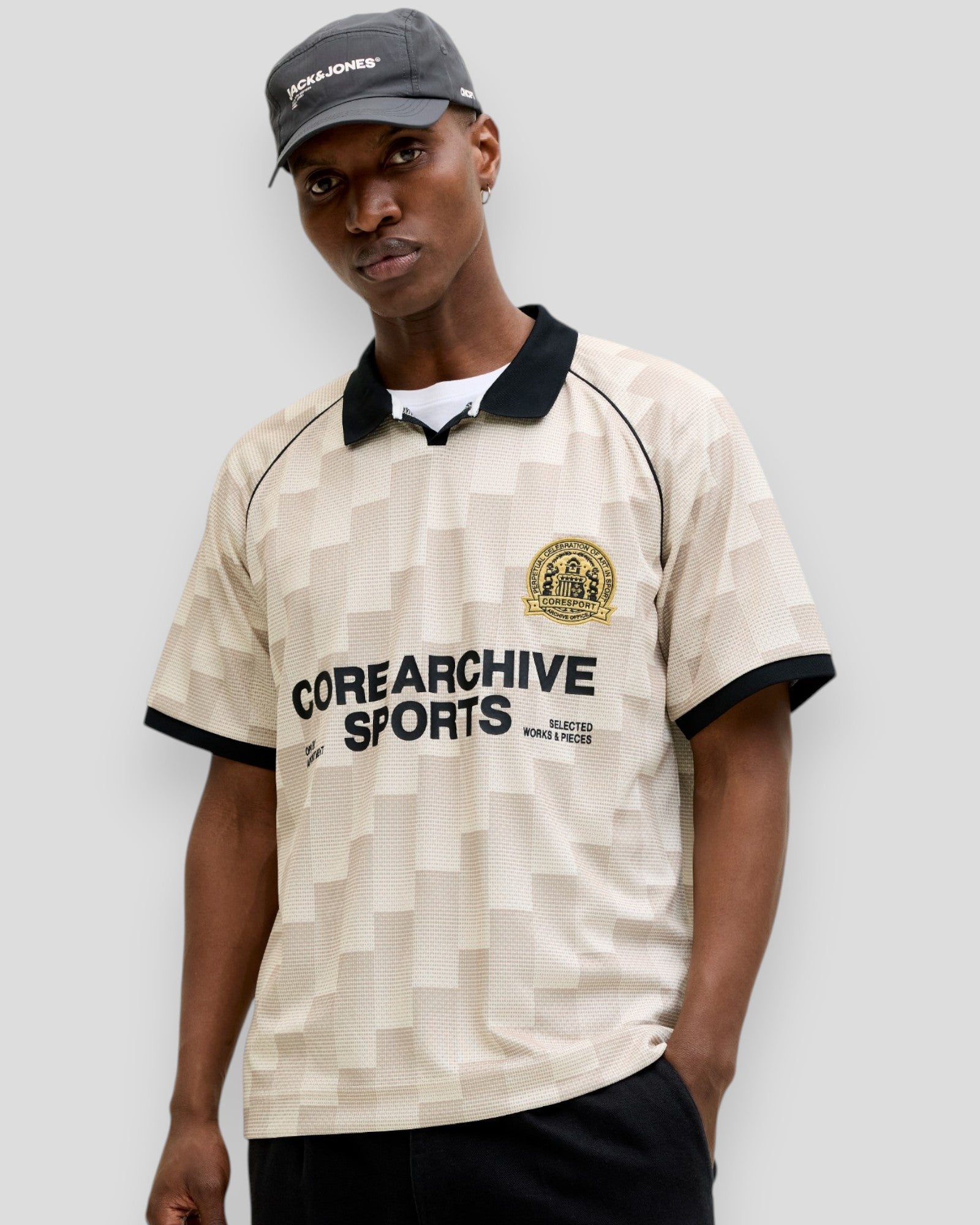 Jack & Jones Breeze Football AOP Mesh Tee SS in Sweet Corn, showing a lightweight, breathable football-themed mesh T-shirt in bright yellow.