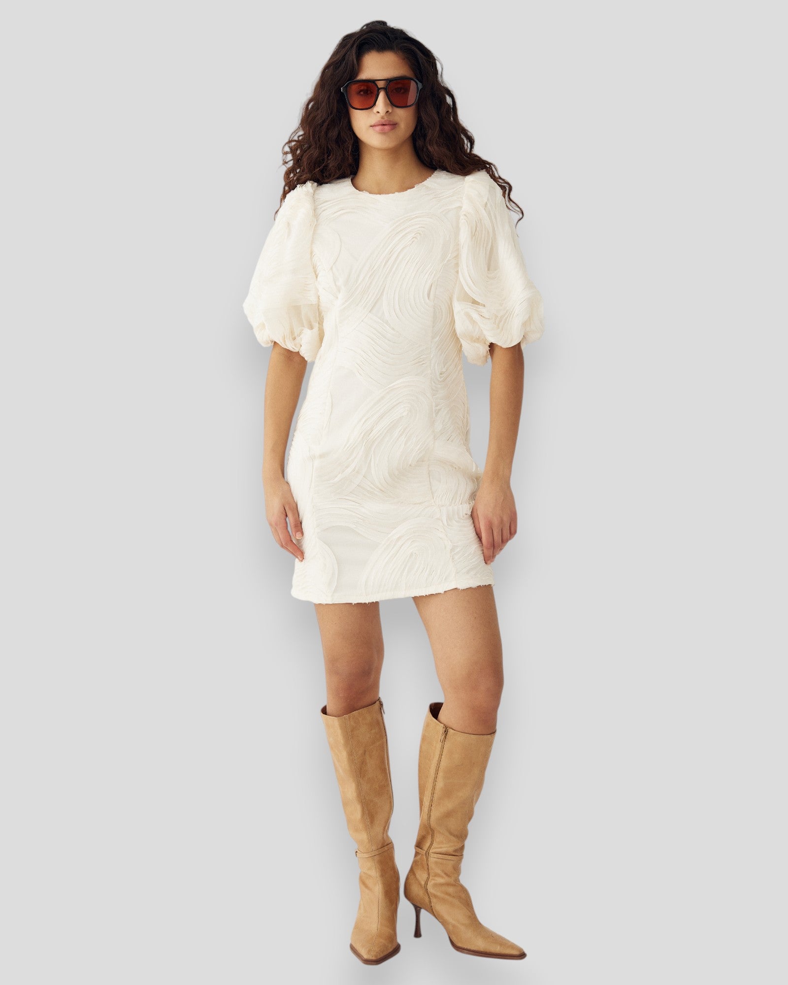 Noella N-Michaela Ivory Dress featuring elegant fabric and a stylish silhouette, perfect for versatile occasions.
