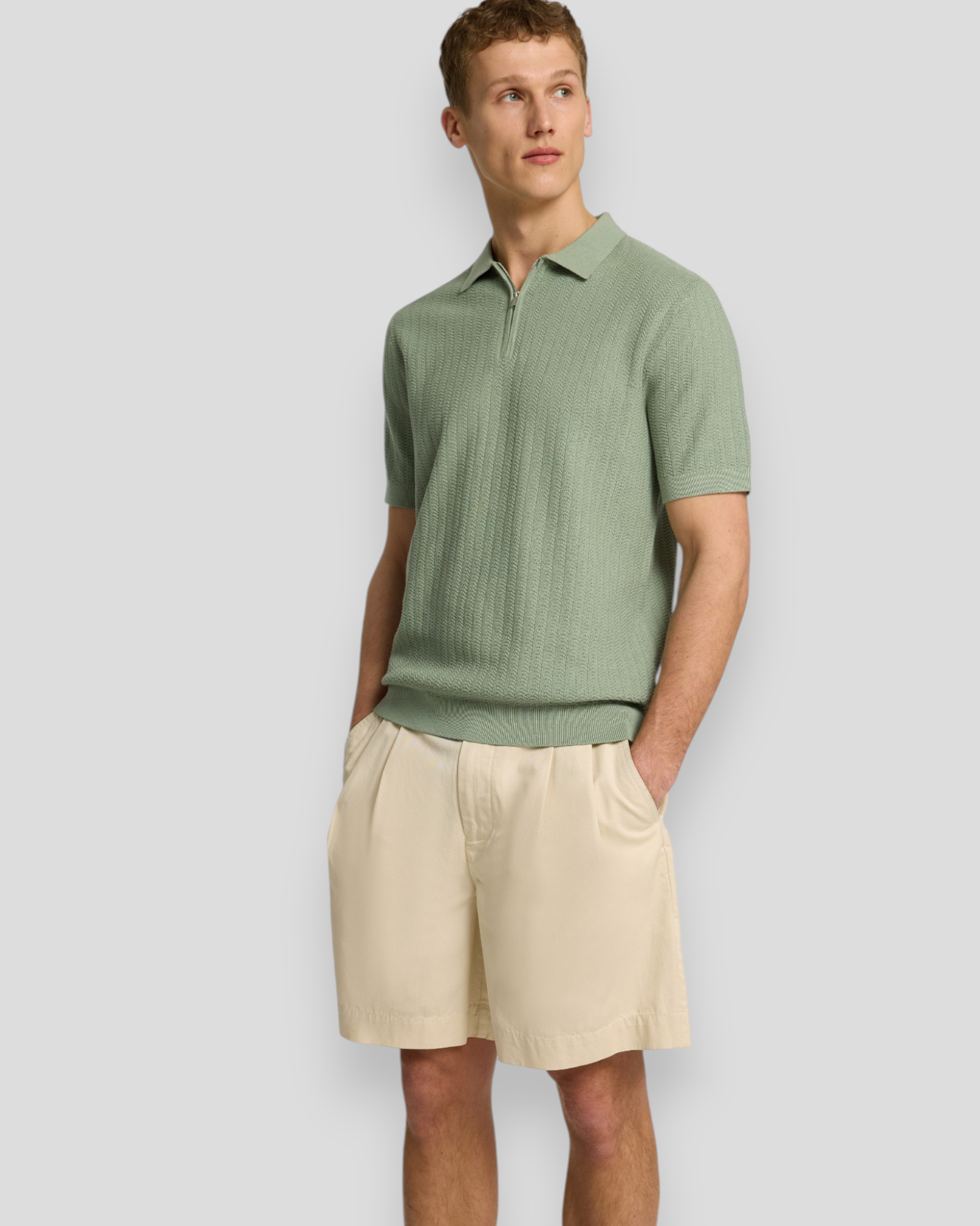 SELECTED HOMME Cran Half Zip Polo i Iceberg Green – strikket, kortærmet polo med halv zip, ideel til både afslappede og stilfulde looks.