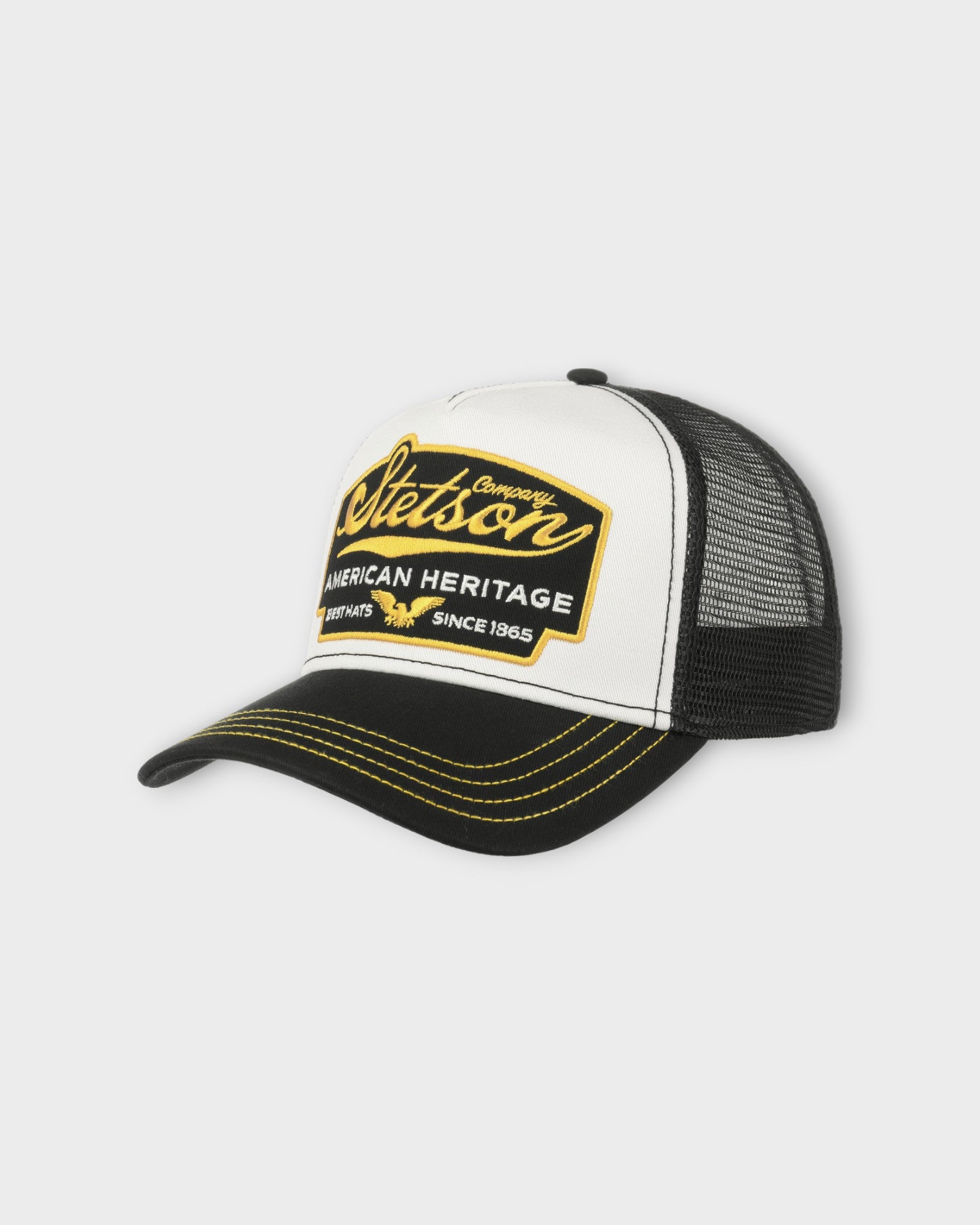 Trucker Cap American Heritage Black fra Stetson Hats. Sort kastet til med med hvid og gul. Her set forfra.