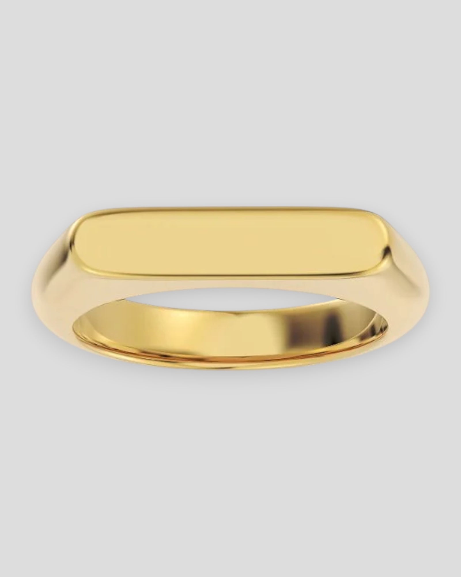 Gold Edblad Charlie Signet Ring for men, featuring a sleek design and bold band, displayed on a neutral background.