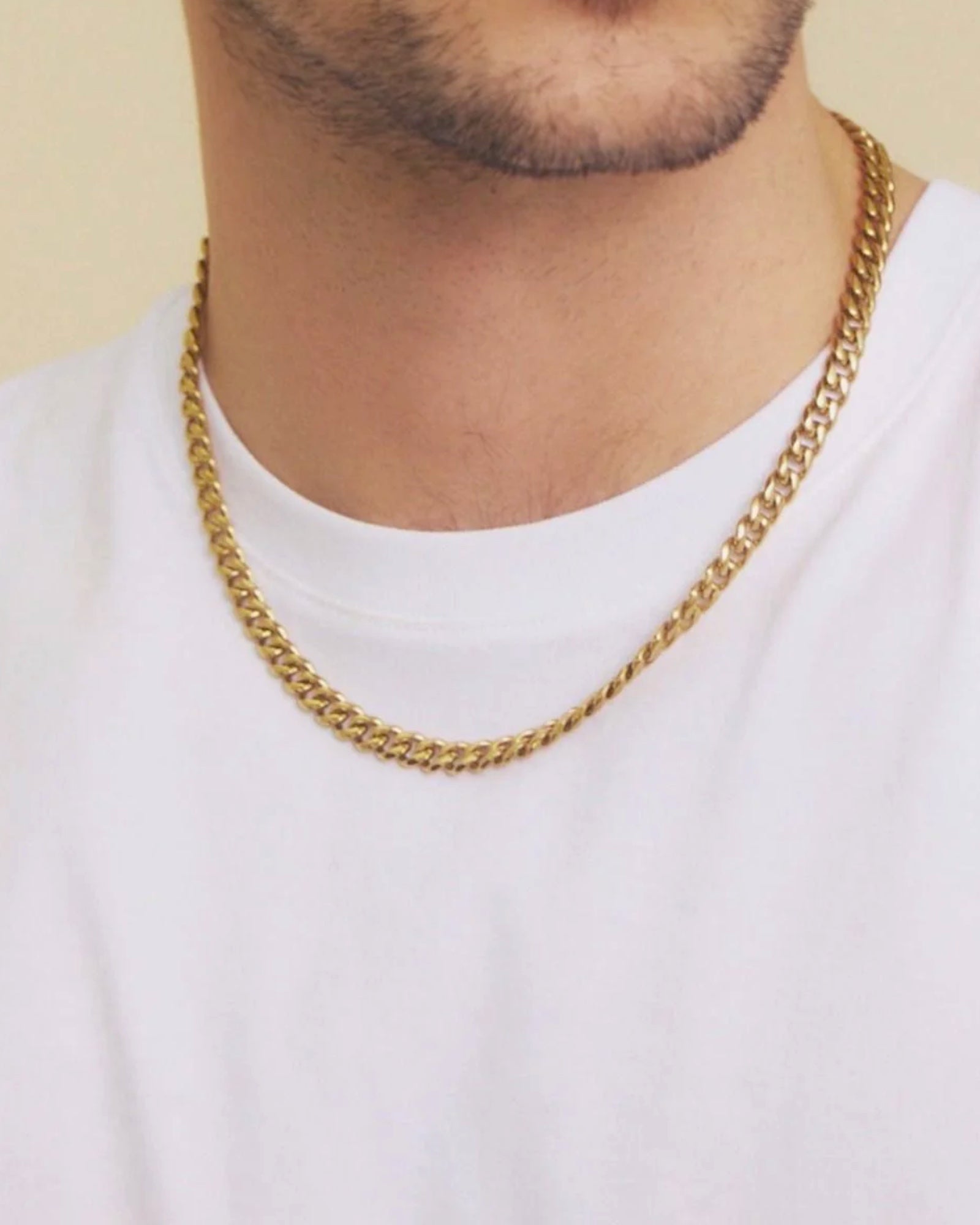 Gold Clark Chain Necklace for men by Edblad, featuring a sleek and stylish design on a plain background.