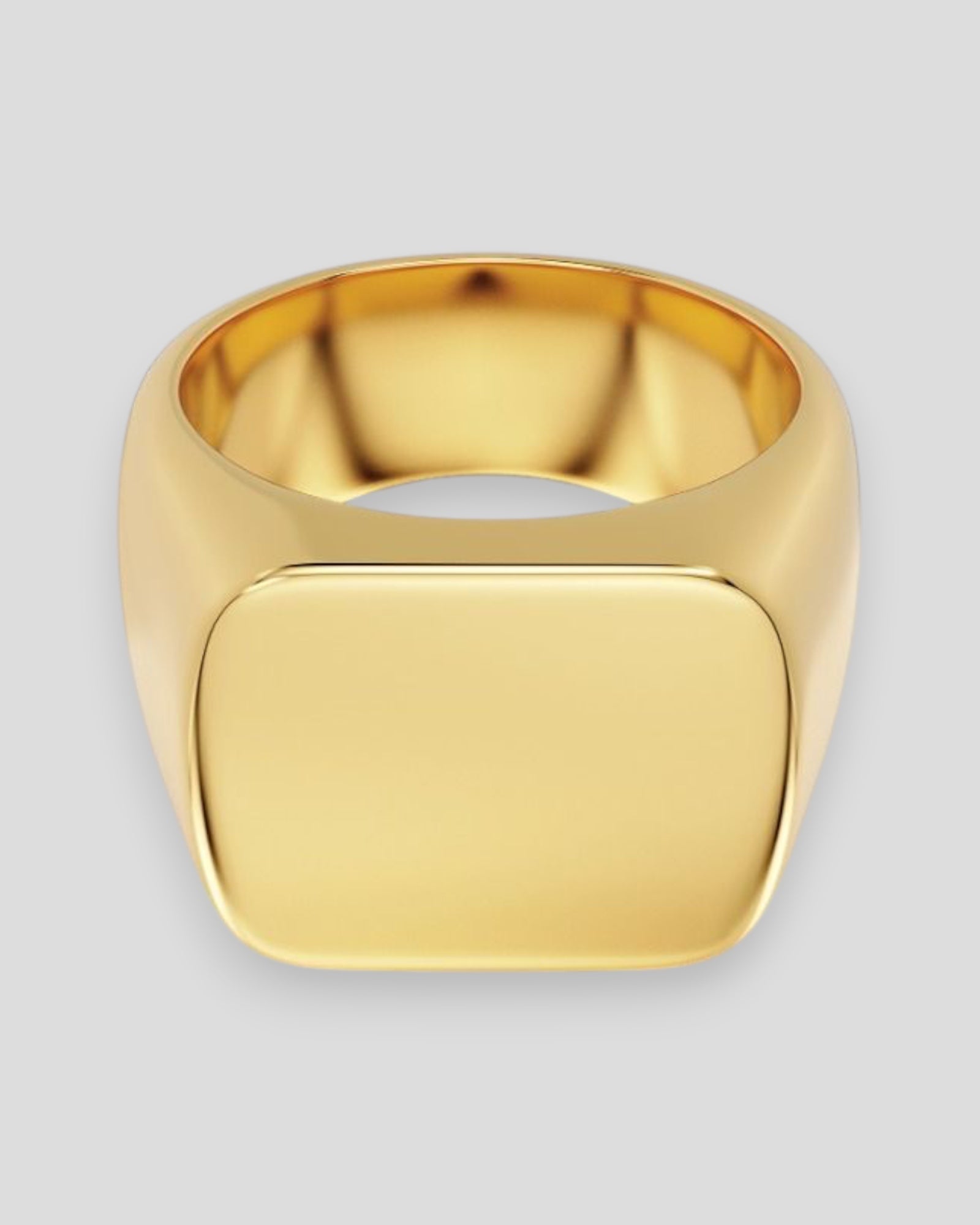 Gold Edblad Ellis Signet Ring for men, featuring a sleek, polished design with a smooth band and bold signet face.