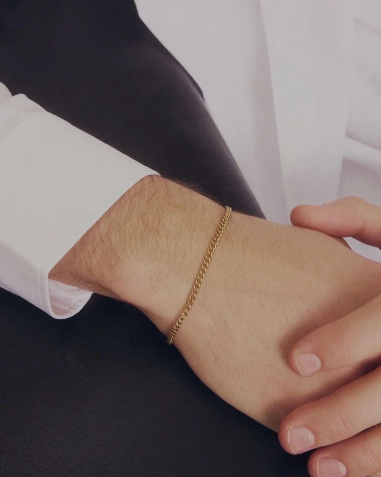 Men's gold Sam bracelet by Edblad featuring a sleek, minimalist design with smooth gold links.