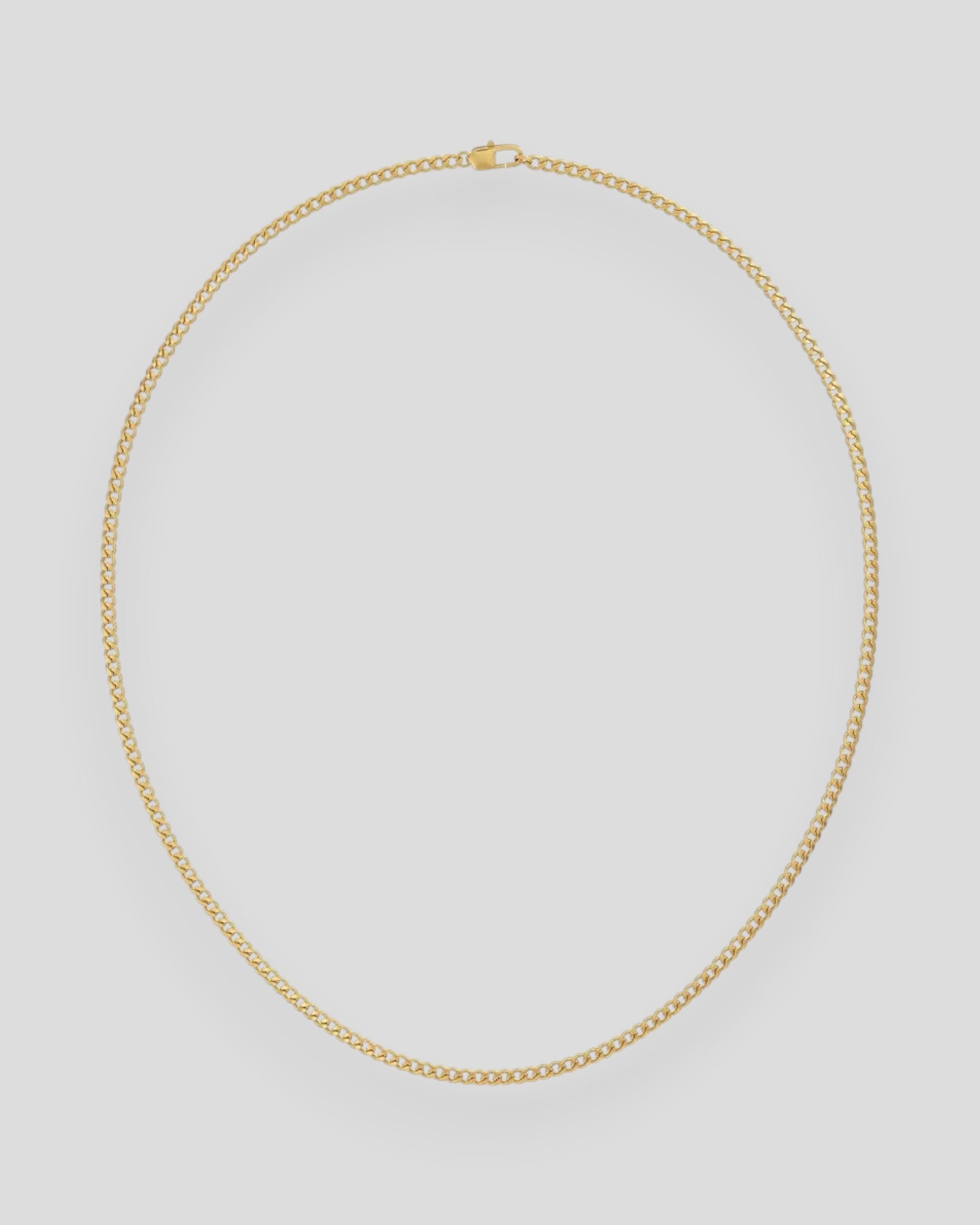 Gold men's Sam necklace by Edblad, featuring a sleek chain design displayed on a neutral background.