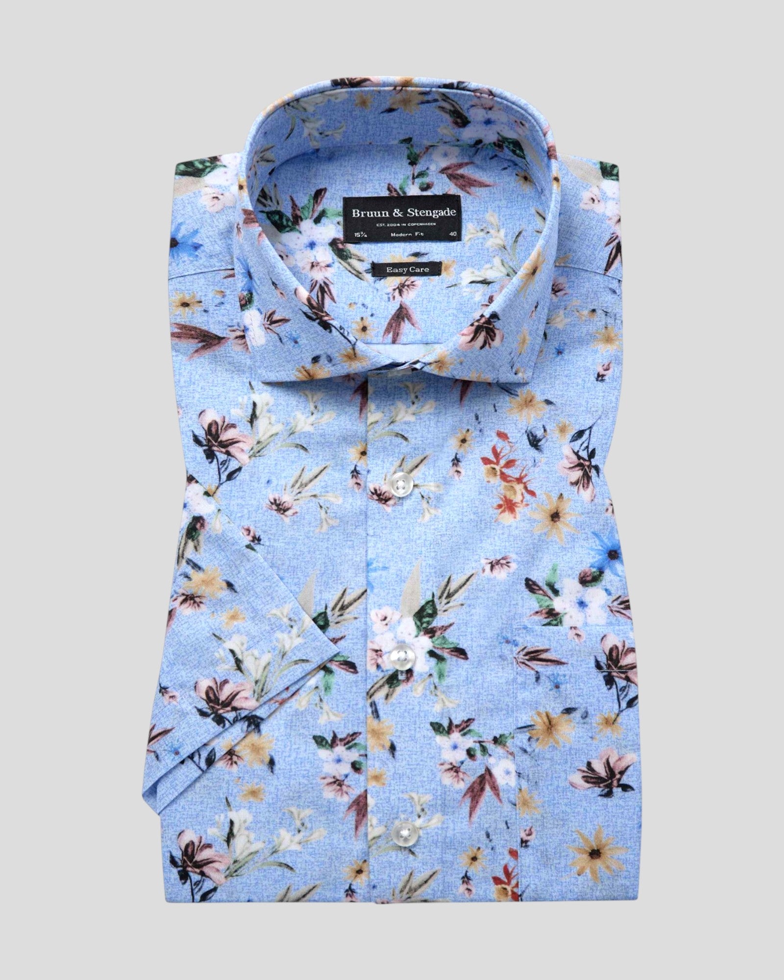 Light blue Manuel Modern Fit Shirt by Bruun & Stengade, displayed flat showing collar, buttons, and tailored fit.