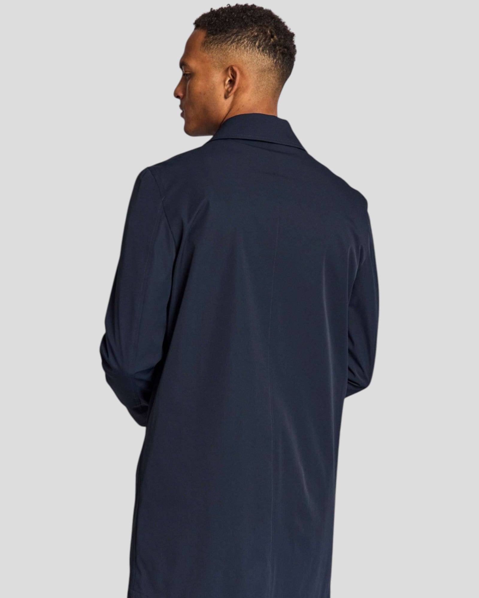 Navy Novello Regular Fit Bruun & Stengade jacket shown on a hanger, featuring a classic design and smooth fabric.