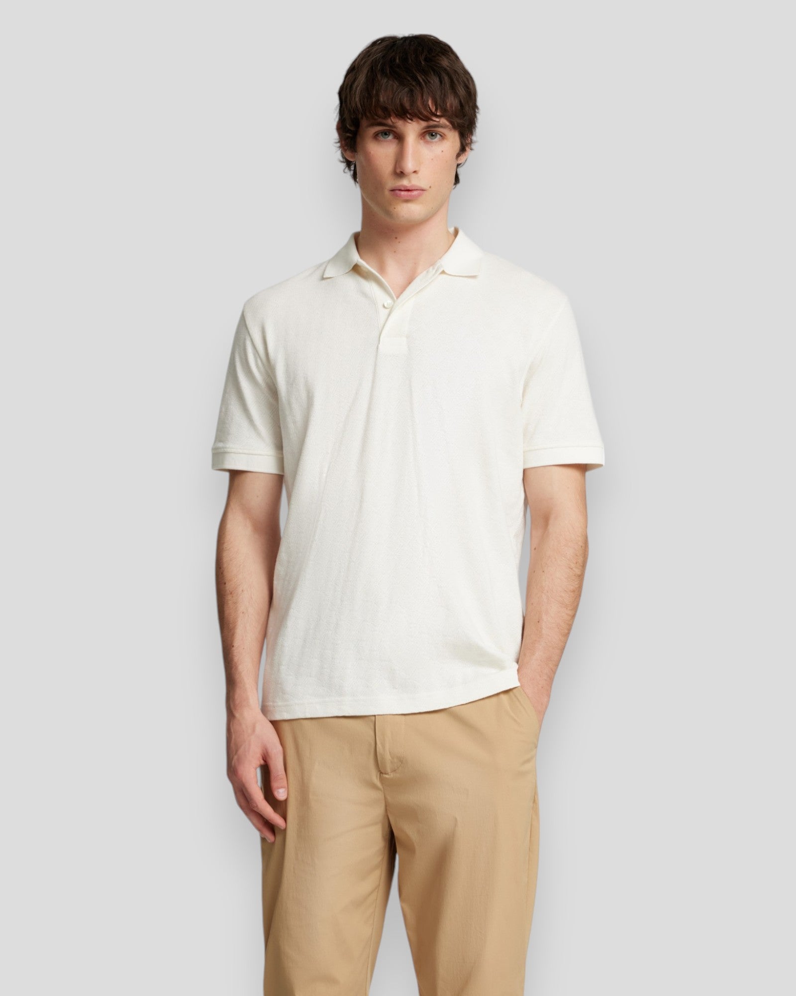 Opdag Paul Jacquard SS Polo fra Selected i creme – moderne design med tidløs elegance og stil