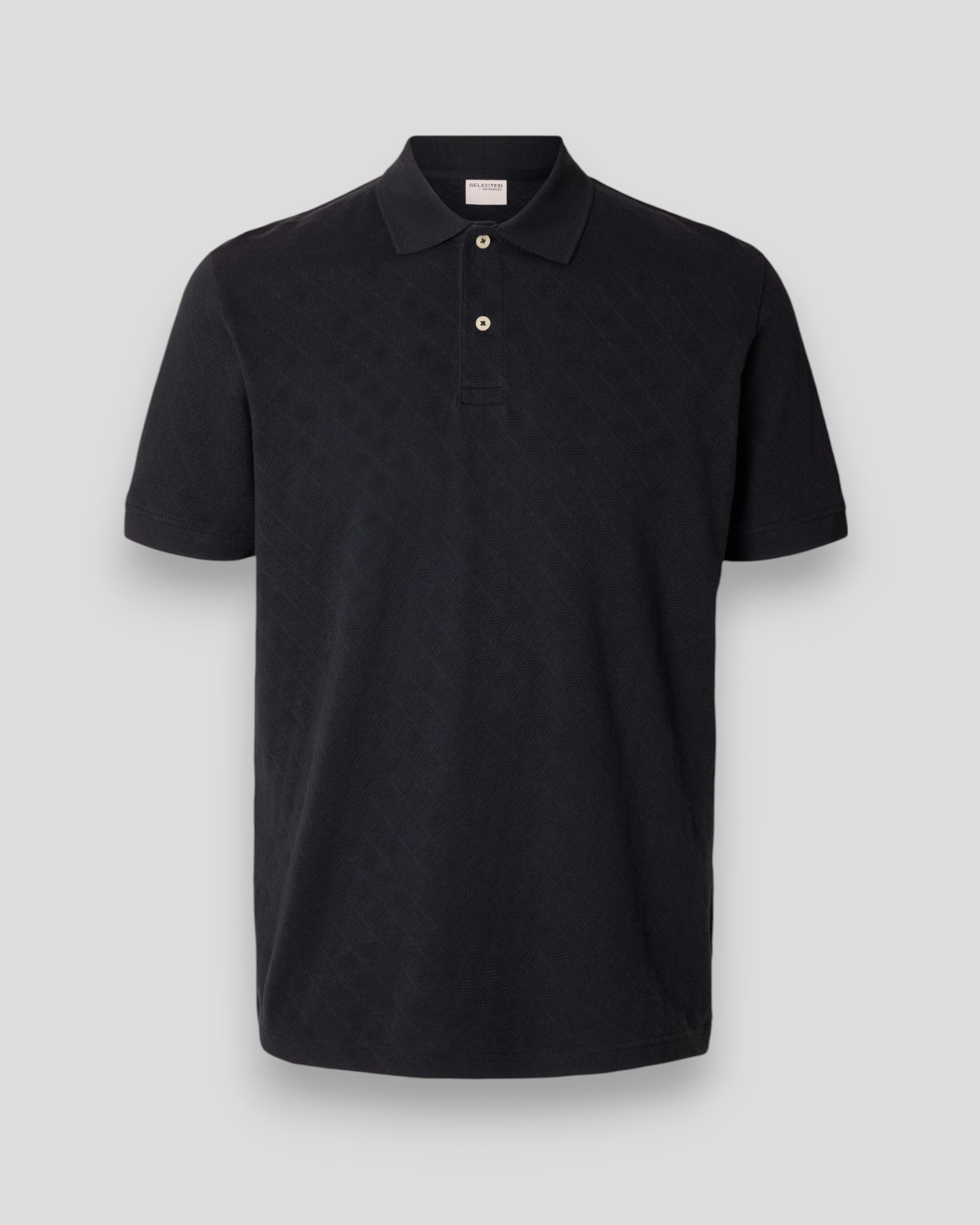 Selected Paul Jacquard SS Polo - Sky Captain i modeludførelse – moderne polo med unikt jacquardmønster.