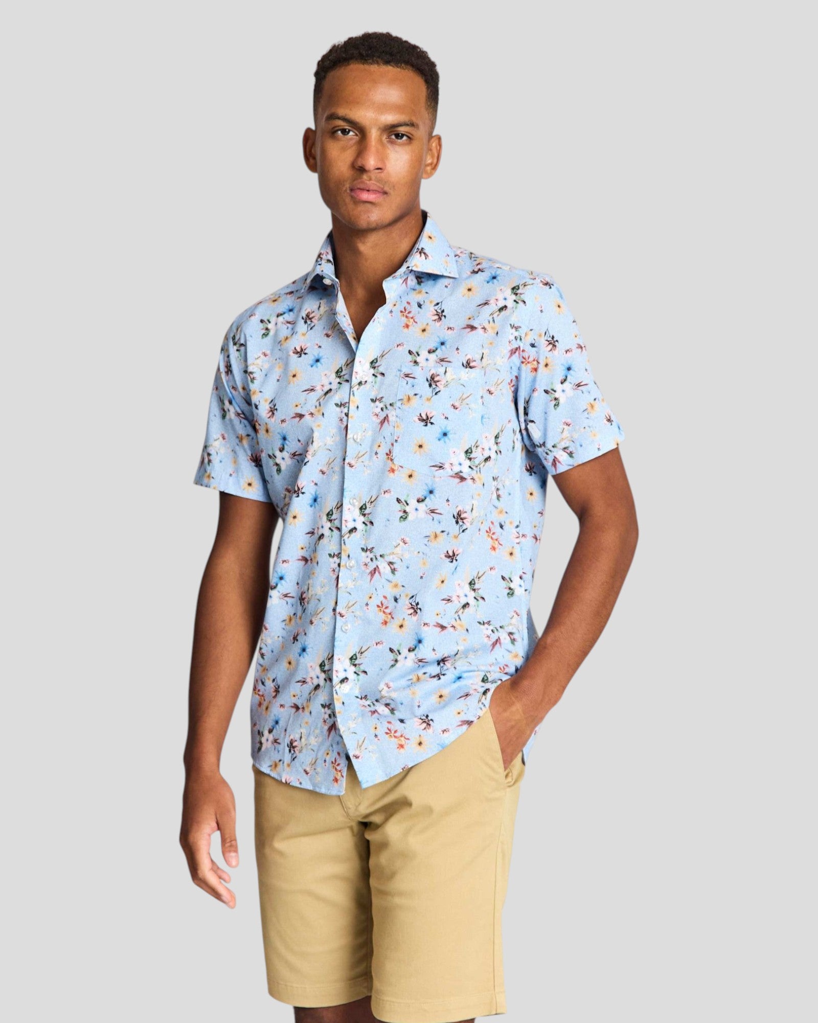 Light blue Manuel Modern Fit Shirt by Bruun & Stengade, displayed on a hanger with a close-up of the fabric and collar details.