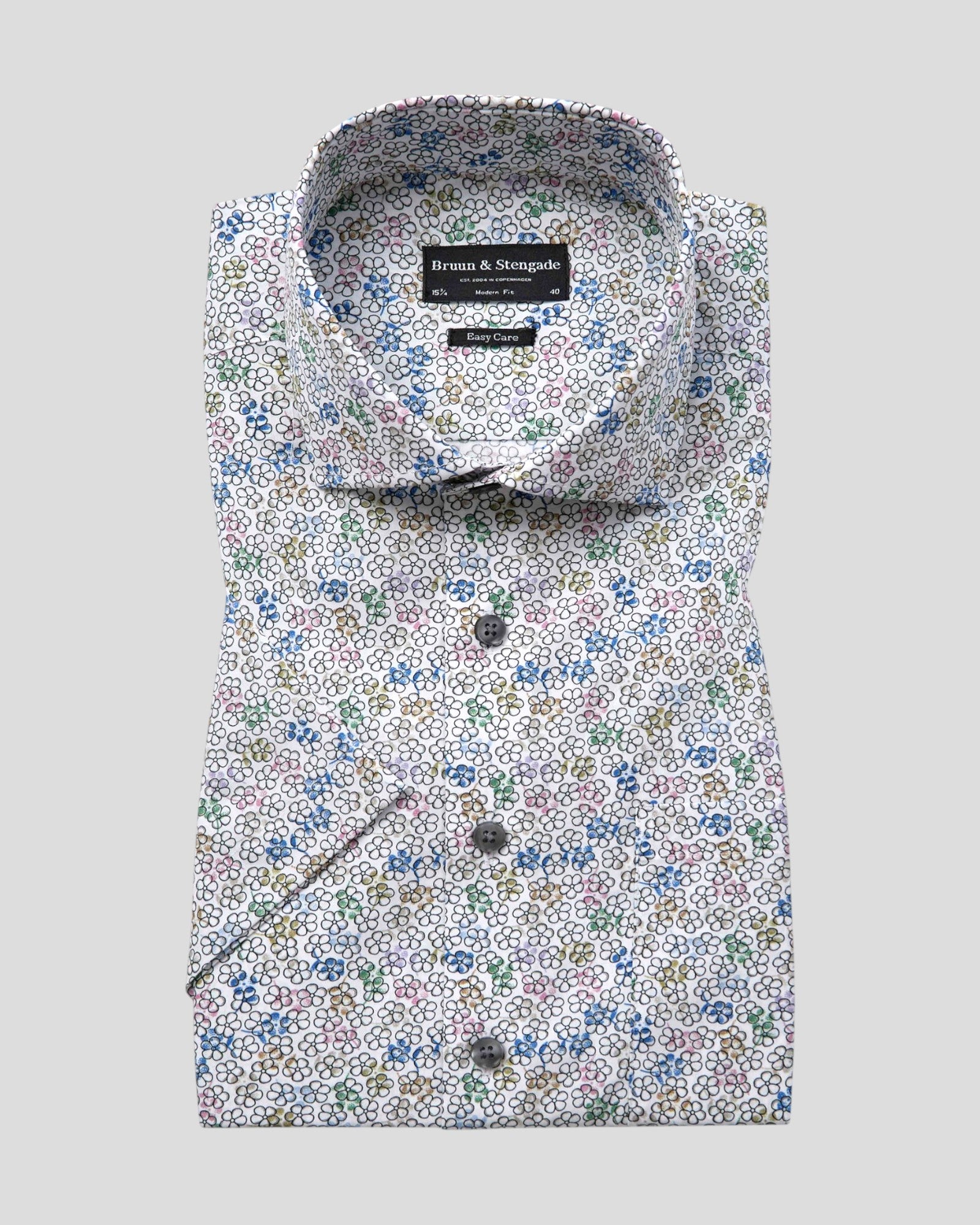 White Luka Modern Fit Shirt by Bruun & Stengade, featuring a sleek design and tailored fit, displayed on a mannequin.