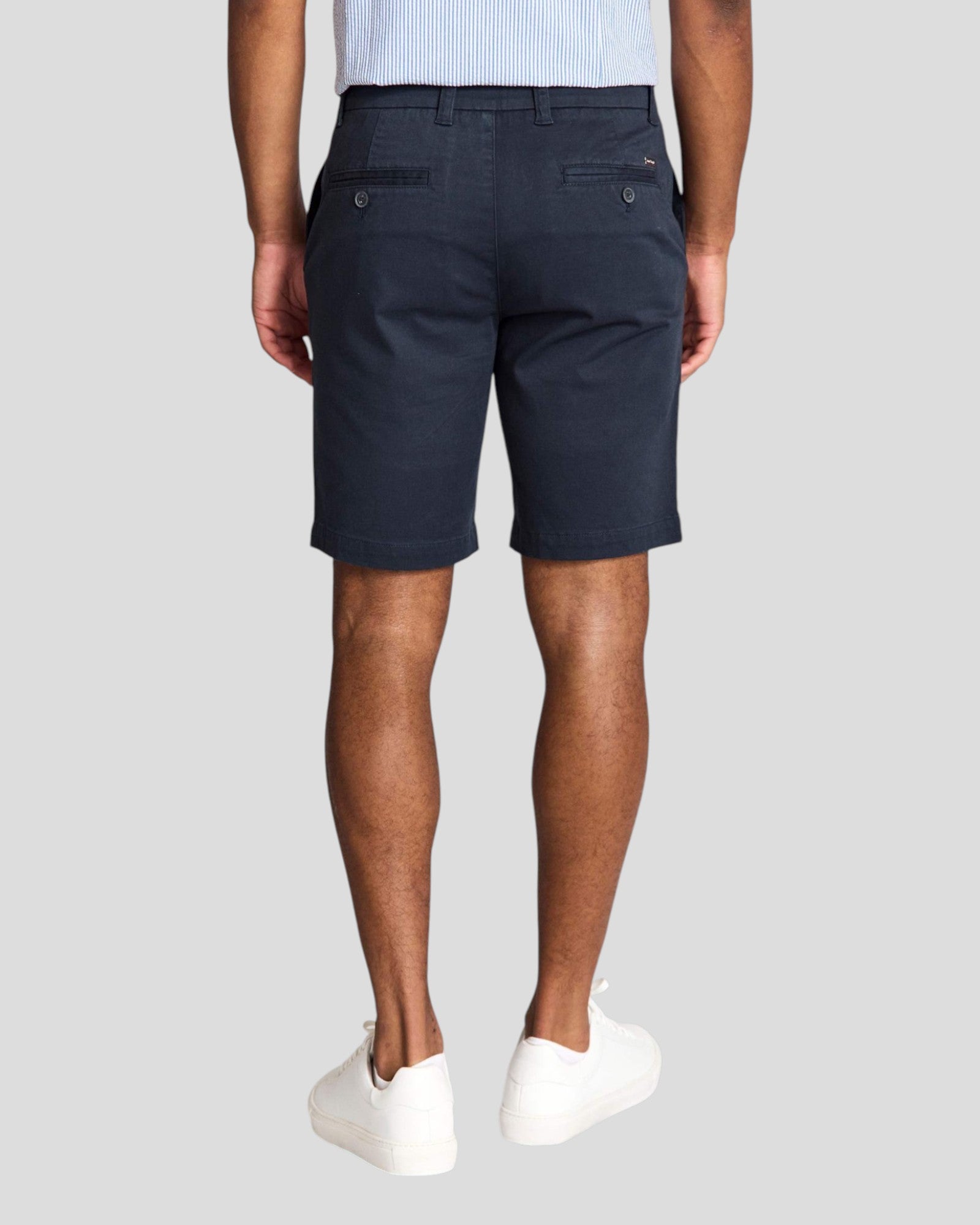 Navy Bruun & Stengade Loris regular fit shorts displayed flat with drawstrings and side pockets, casual summer style.