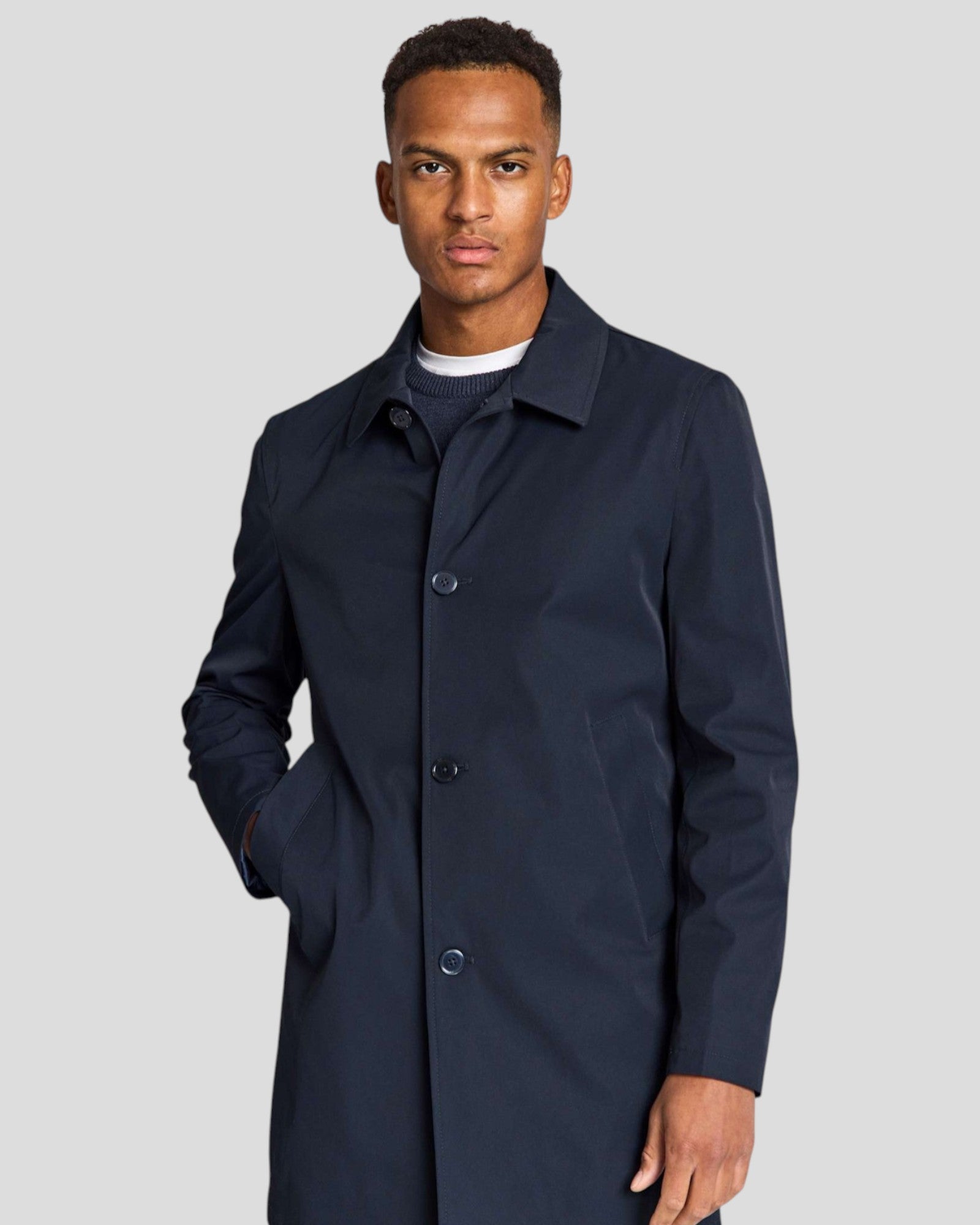 Navy Novello regular fit Bruun & Stengade jacket shown on a hanger, featuring a classic design and clean lines.