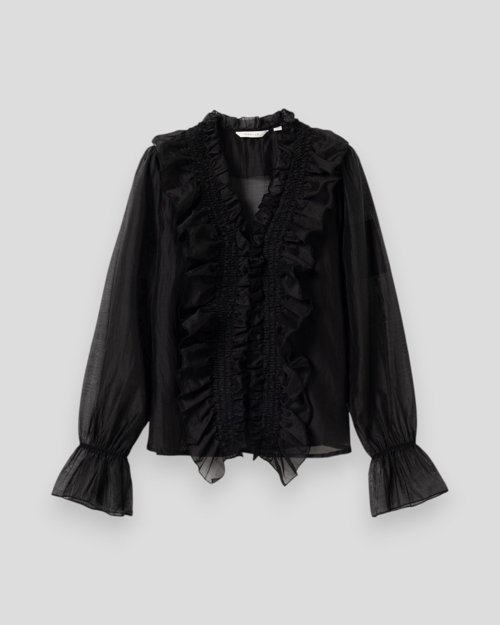 Sort N-Myrtia Bluse til kvinder fra Noella, vises med krave og lange ærmer på en model.