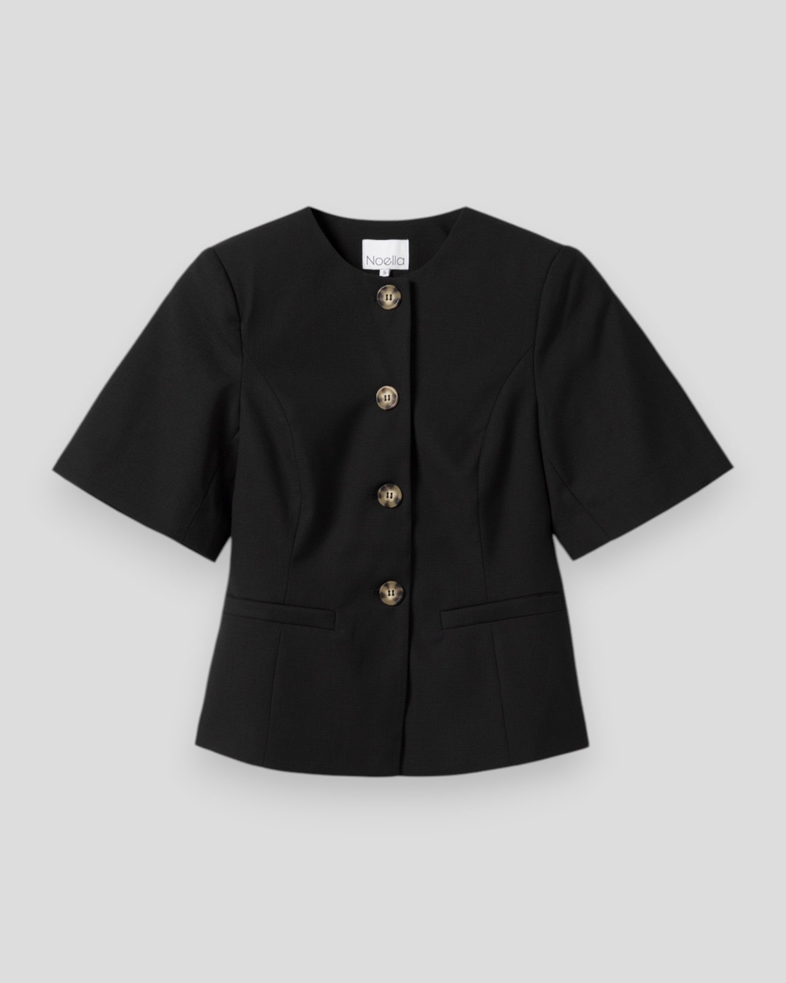Noella Kasaundra black women's blazer, tailored fit with classic lapels and long sleeves, stylish formal or office wear.