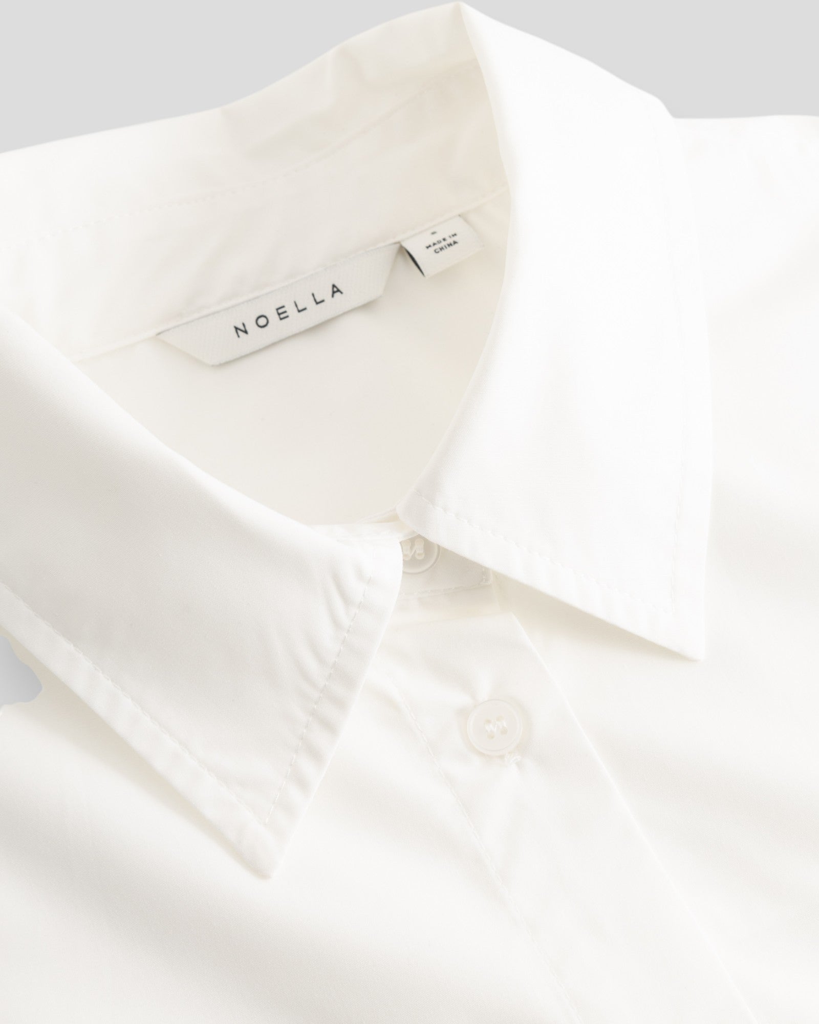 White N-Marlon women's shirt by Noella, showcasing a stylish and comfortable design with a classic collar and button front.