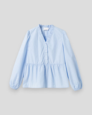 Let bluse fra Noella i lyseblå med lange ærmer og løs pasform, perfekt til hverdag.