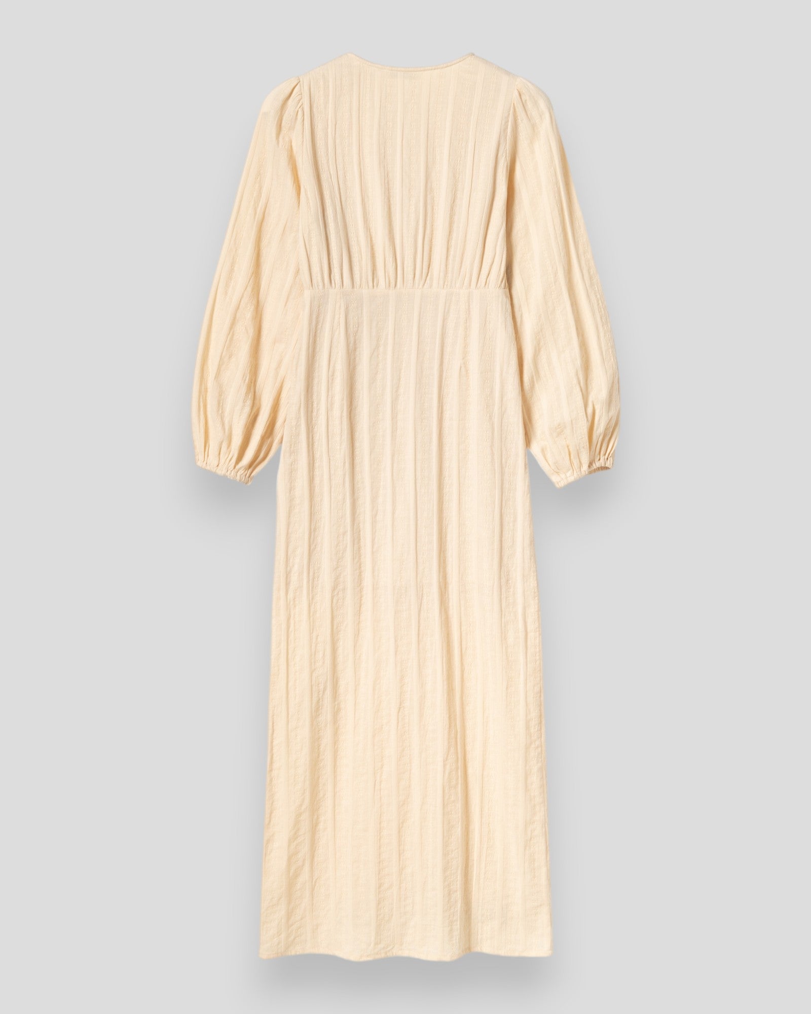 Noella N-Liletta Ivory dress featuring a flowing fabric and elegant design, perfect for stylish occasions.