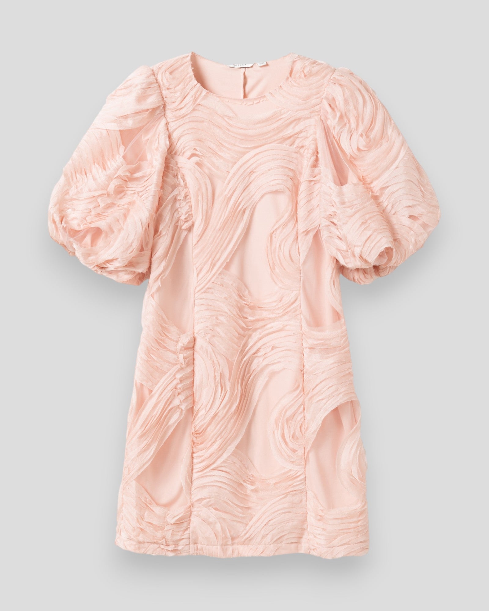 Noella N-Michaela dress in baby pink, featuring soft fabric and a stylish design, shown on a hanger.