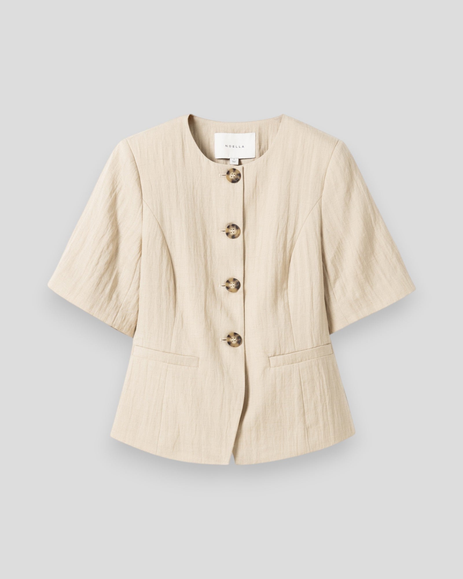 Noella N-Kasaundra dameblazer i oyster stof med revers og slids foran, elegant og sofistikeret til kvinder.