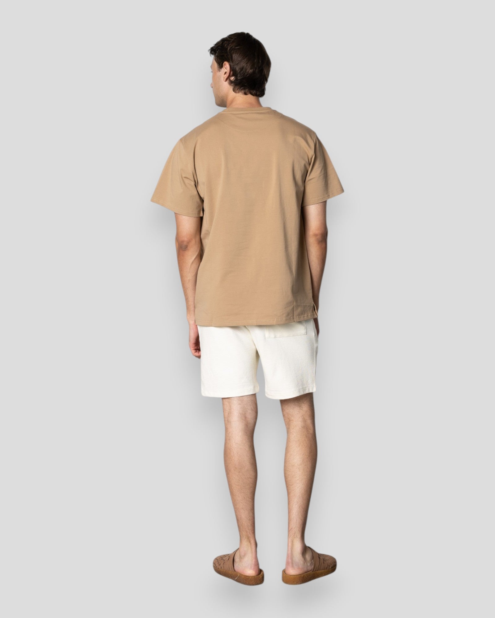Ecru Calton strukturerede shorts fra Clean Cut Copenhagen vist foran, med synlige lommer og afslappet pasform.