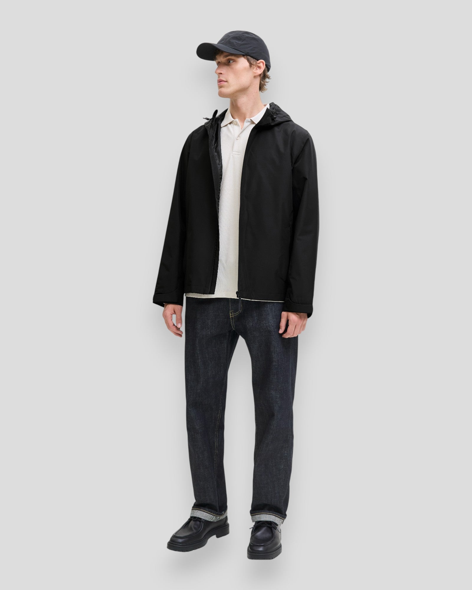 Black Flynn functional jacket by Jack & Jones, featuring a modern design and durable fabric, suitable for outdoor wear.