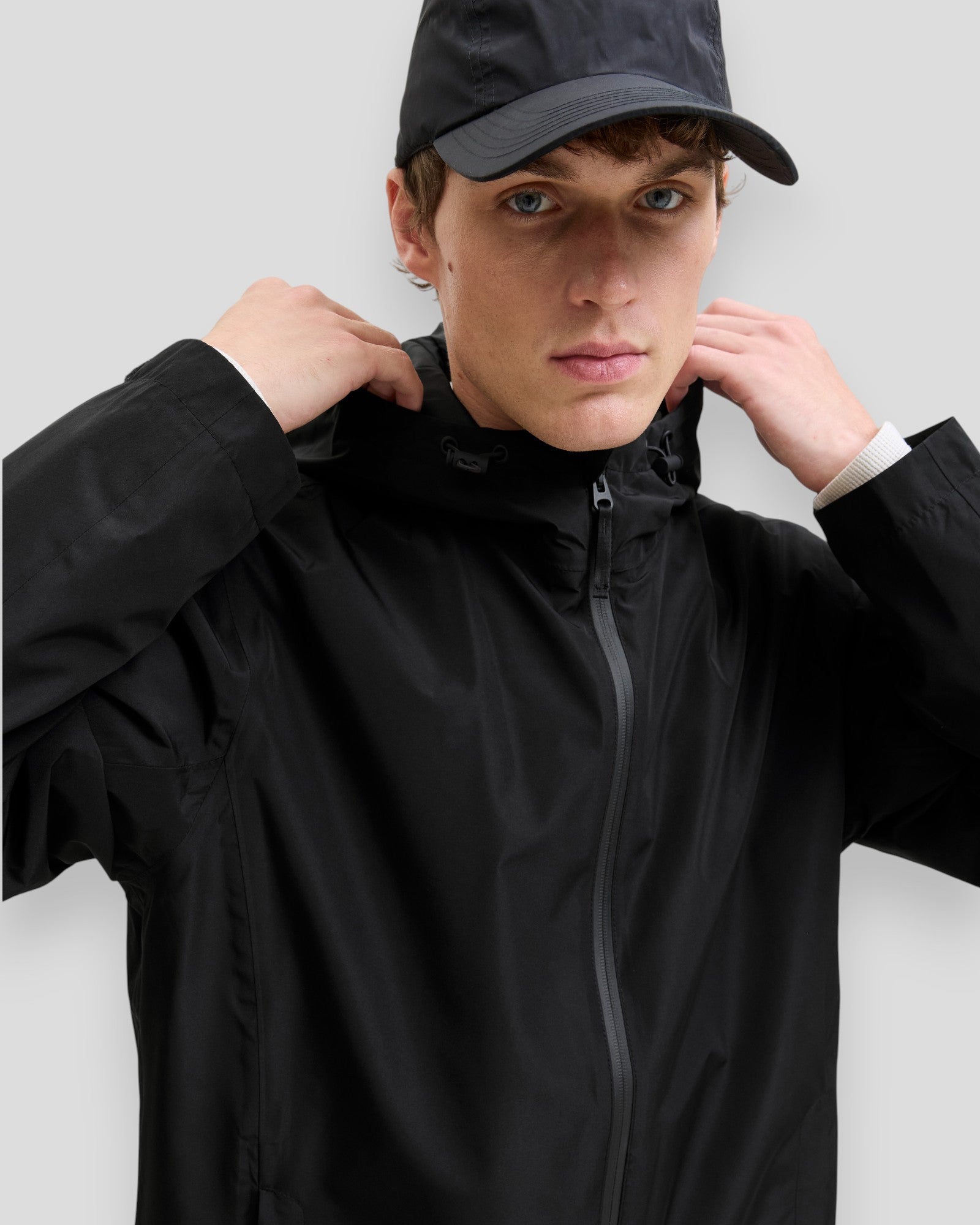 Black Jack & Jones Flynn functional jacket with zip front and adjustable hood, suitable for autumn and winter wear.
