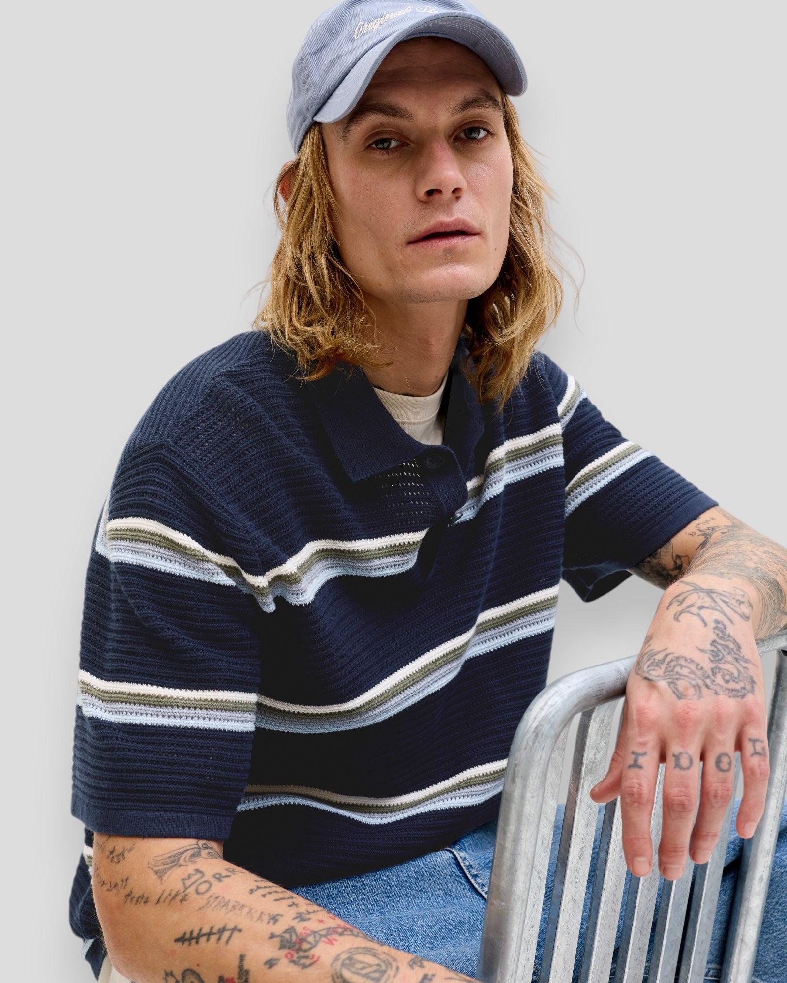 Sky Captain Maine Knit Stripe Polo by Jack & Jones, featuring a classic striped design and a polo collar, perfect for casual wear.