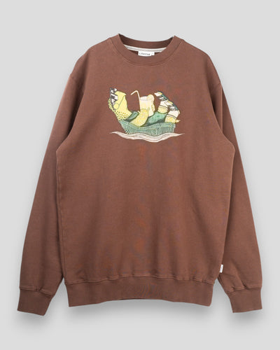 Lakor Slow Flow Crewneck sweatshirt in Chicory Coffee with a relaxed fit and soft fabric, displayed on a hanger.