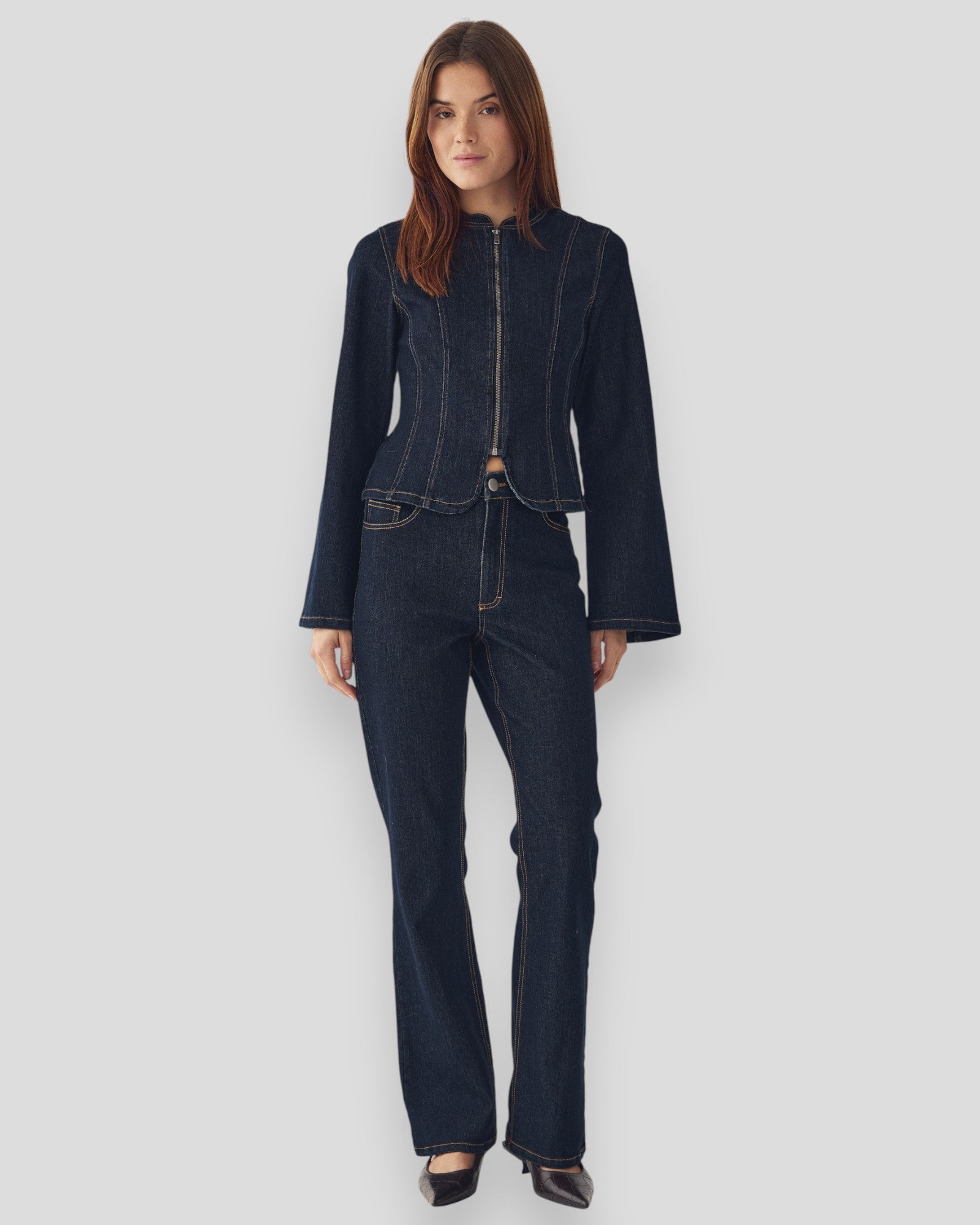 Blue unwashed N-Mazie women's jacket by Noella, shown on a hanger with a casual fit and lightweight fabric.