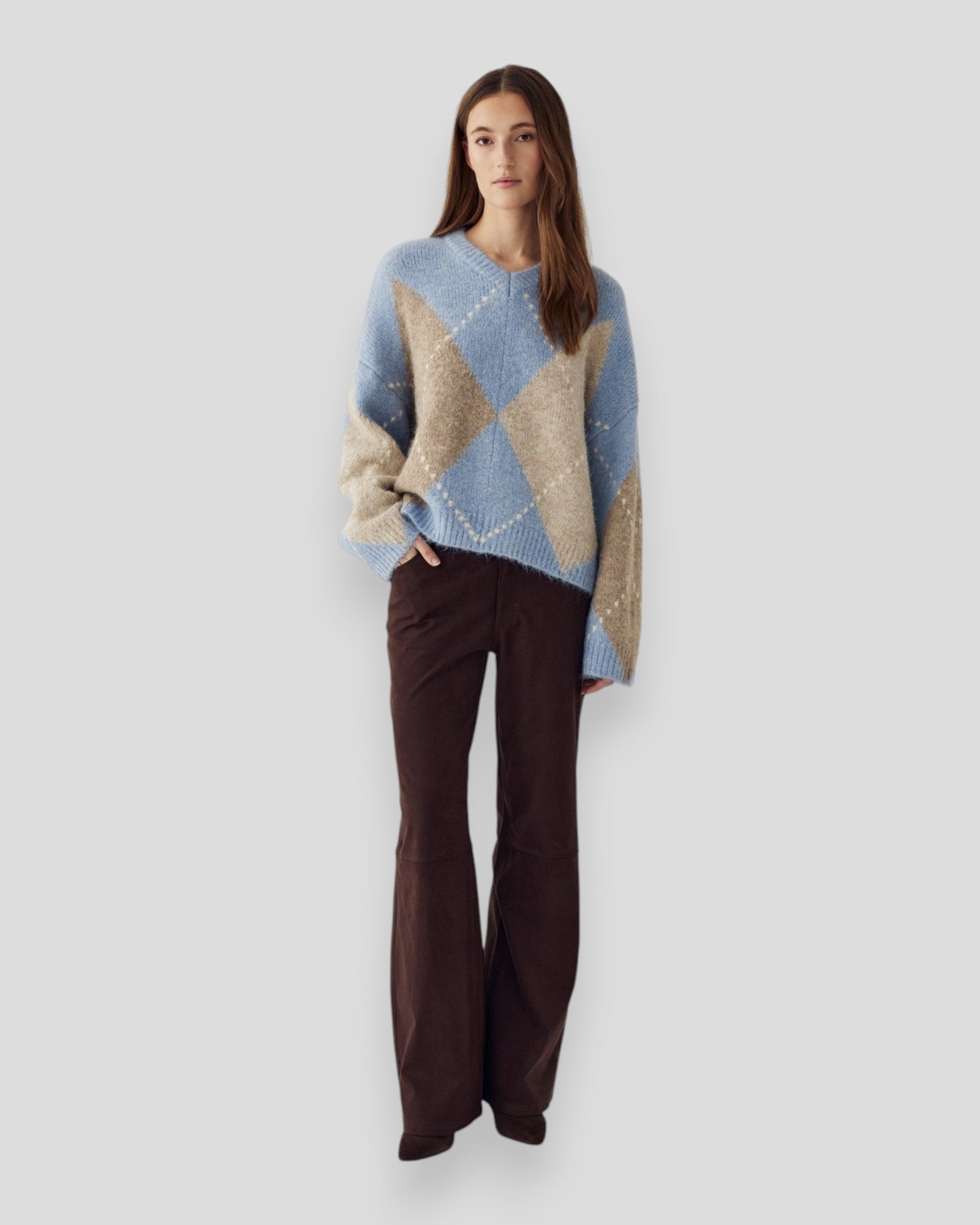 Sky blue mixed knit sweater for women by Noella, featuring a cozy and stylish wool blend design.