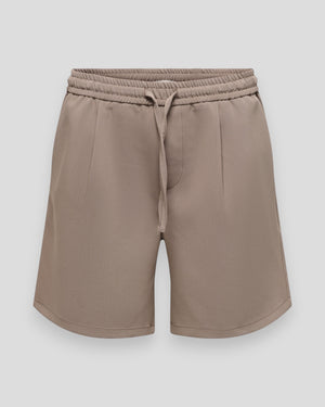 Let løse, beige ONLY & SONS Will 0292 shorts i bomuld med løs pasform, vist på model.