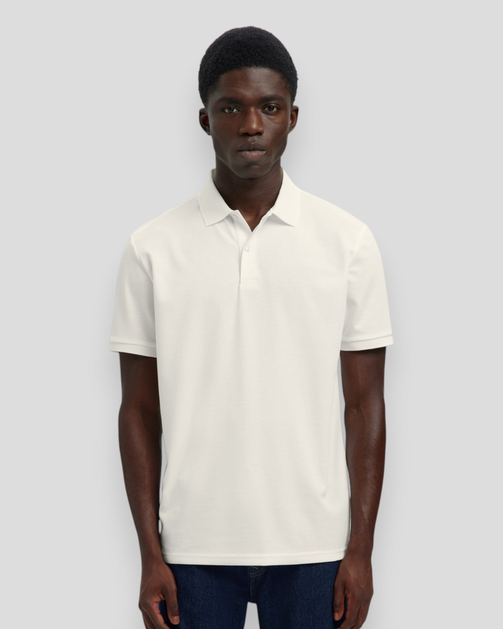 Hvid Selected Fave Button SS Polo i let bomuld med knapper foran, stilfuld og behagelig til sommerbrug.