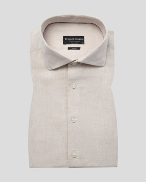 Bruun & Stengade Tahaka modern fit sand-colored shirt with collar and button front, displayed on a mannequin.