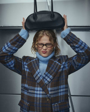 Black Noella Iris Bag for women, stylish and compact women's handbag with sleek design and top handle.