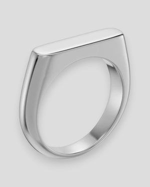 Men's Charlie Signet Ring by Edblad in stainless steel, featuring a sleek, polished design on a plain background.