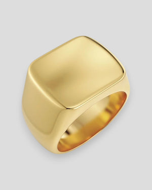 Edblad Ellis Signet Ring in gold, men's ring with a smooth, polished finish and classic design, displayed on a neutral background.