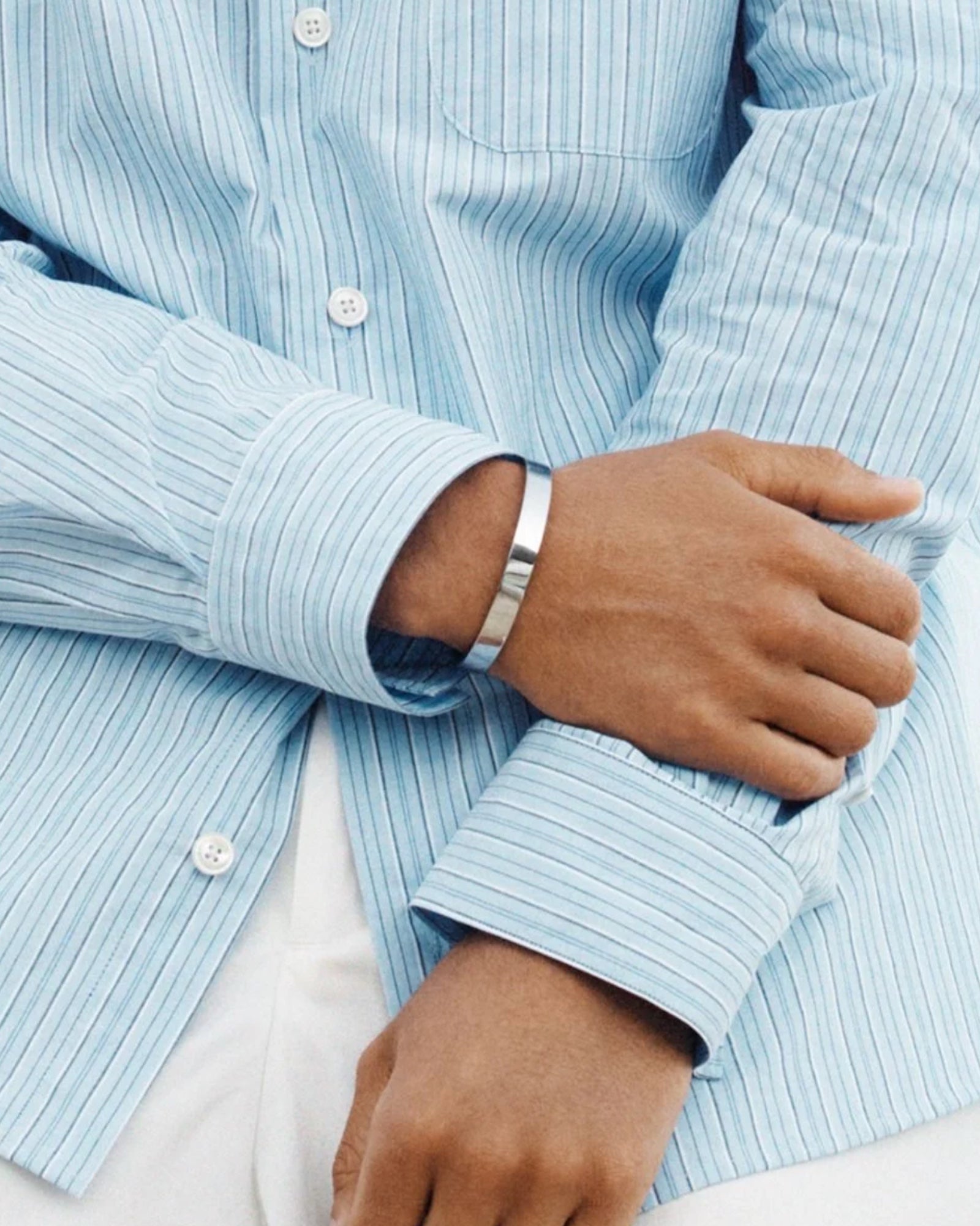Men's Jesse Bangle by Edblad in sleek steel, featuring a modern, minimalist design bracelet on a neutral background.