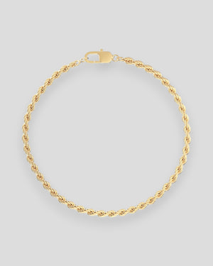 Guld Marvin armbånd til mænd fra Edblad, vises med tæt fokus på det enkle, elegante design og guldfarvet metal.