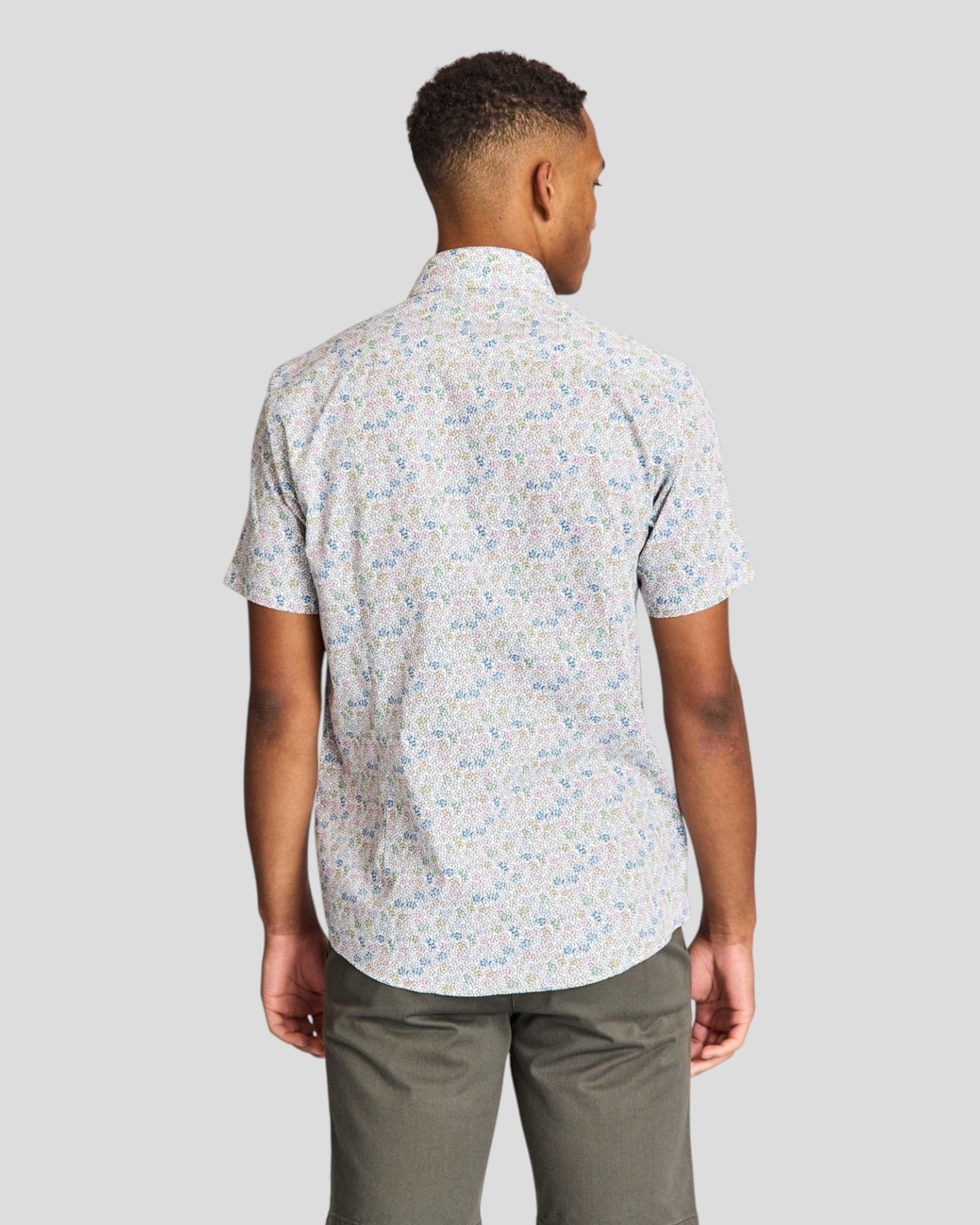White Luka modern fit shirt by Bruun & Stengade, shown on a hanger with a crisp collar and sleek design.